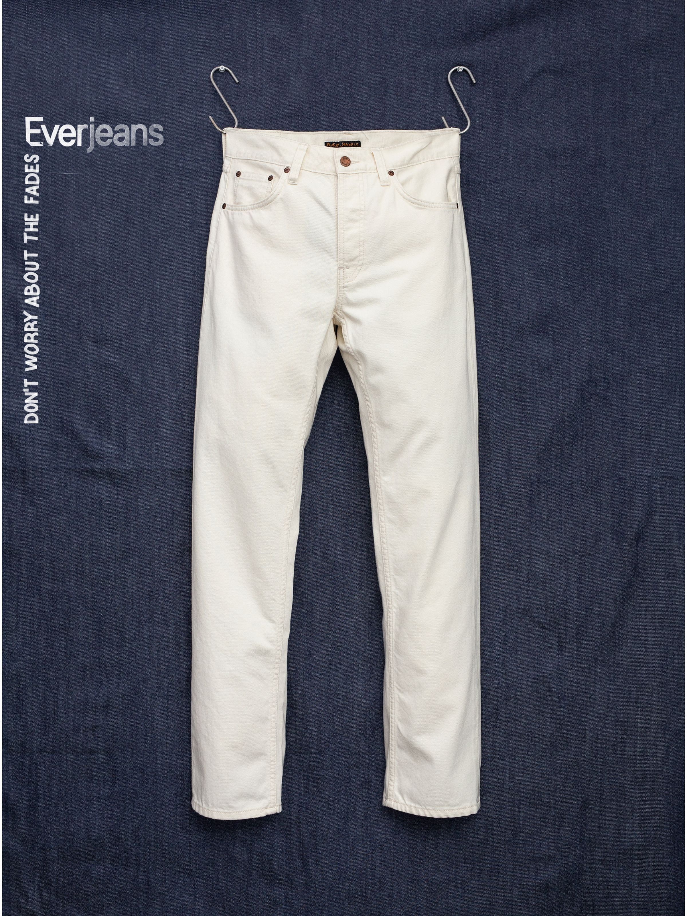 Nudie Jeans Rad Rufus Everivory, ivory regular-fit straight-leg rigid denim jeans shown in a front flatshot.