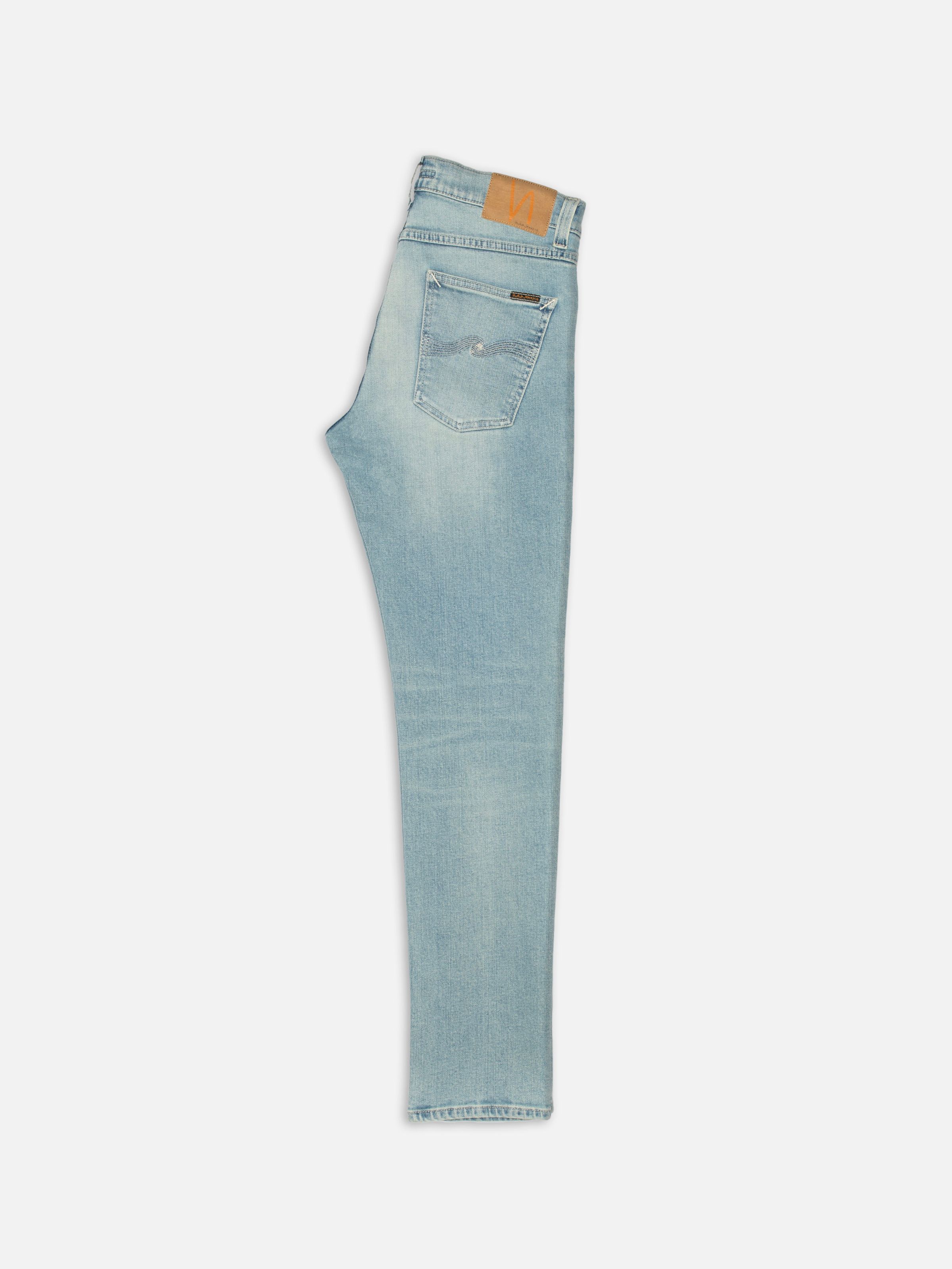 Nudie Jeans Lean Dean Shallow Sea, men's slim tapered jeans, shown from the side against a white background.