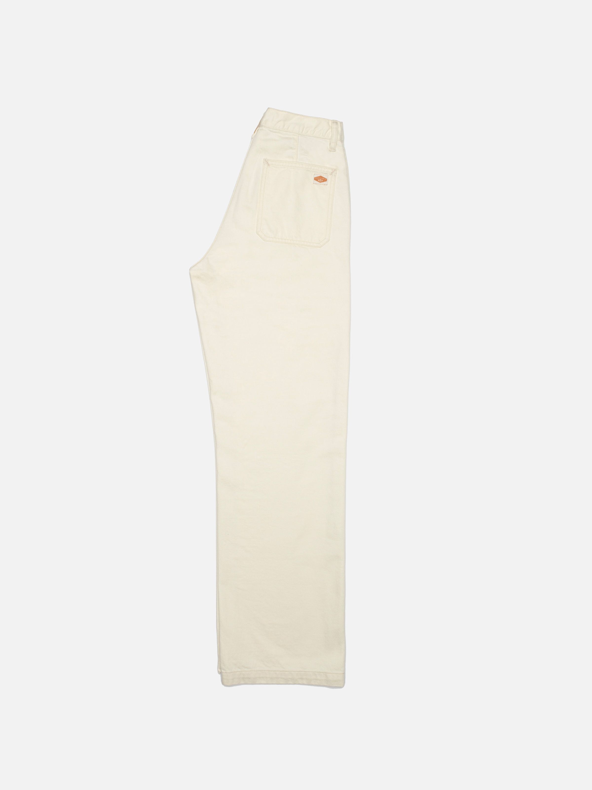 Nudie Jeans Asta Workwear Pants Ivory, women's wide-leg denim pants shown from the side against a white background.