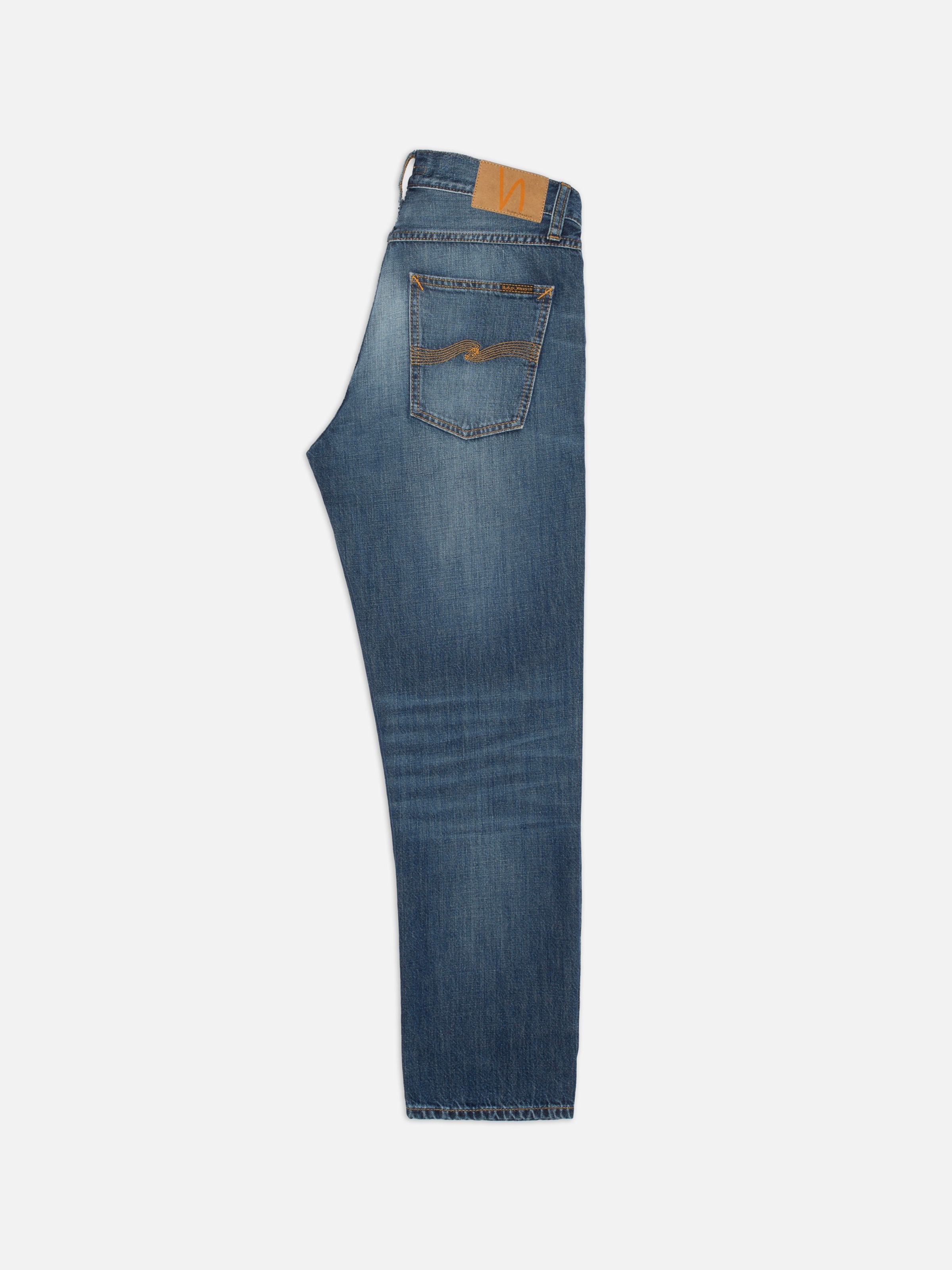 Nudie Jeans Gritty Jackson Sun Set, men's regular fit straight leg jeans in mid-blue wash, side view.