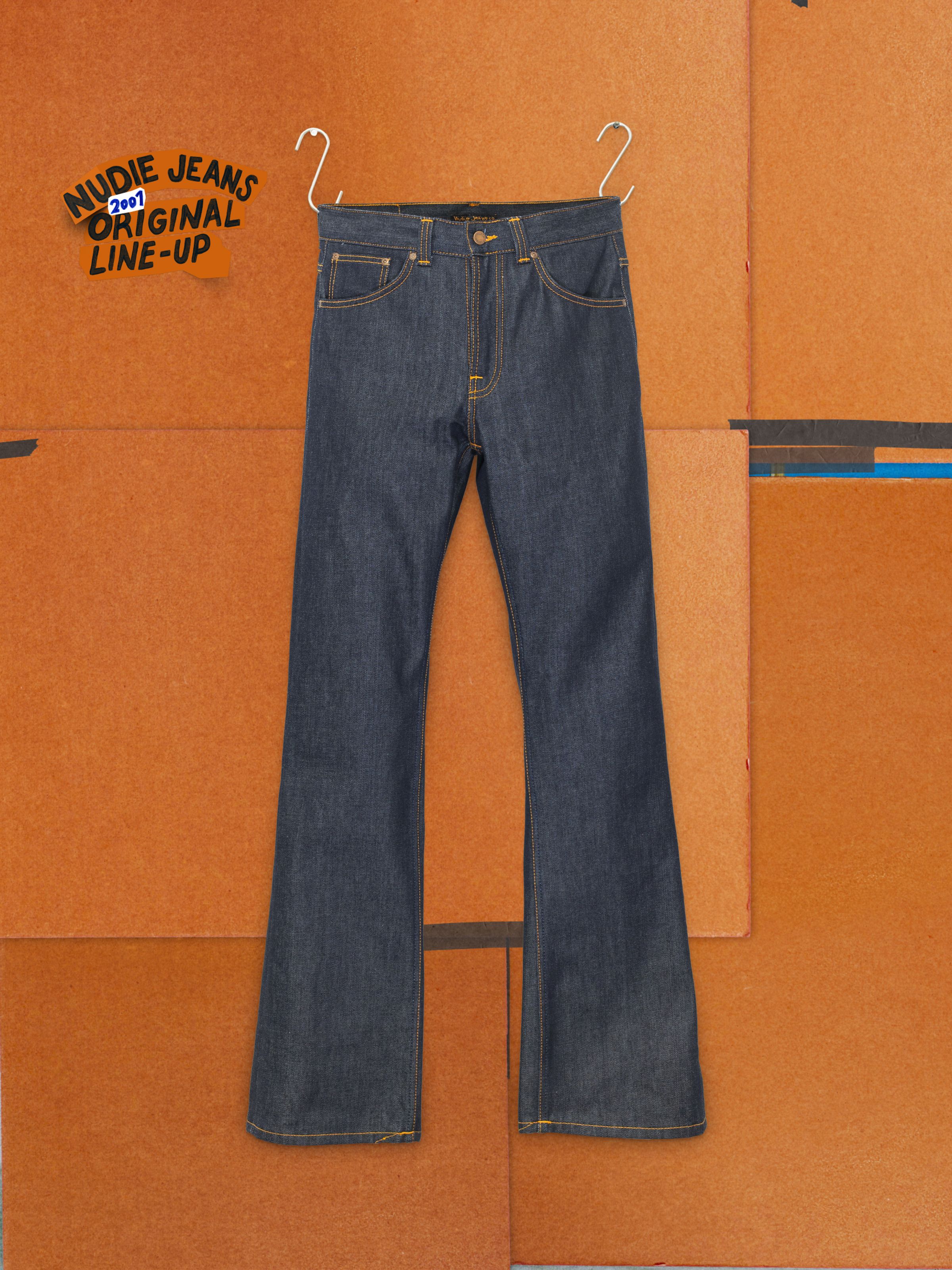Nudie Jeans Flare Glenn Dry One, men's flared jeans in dry blue rigid denim with orange stitching, shown in a flat shot.