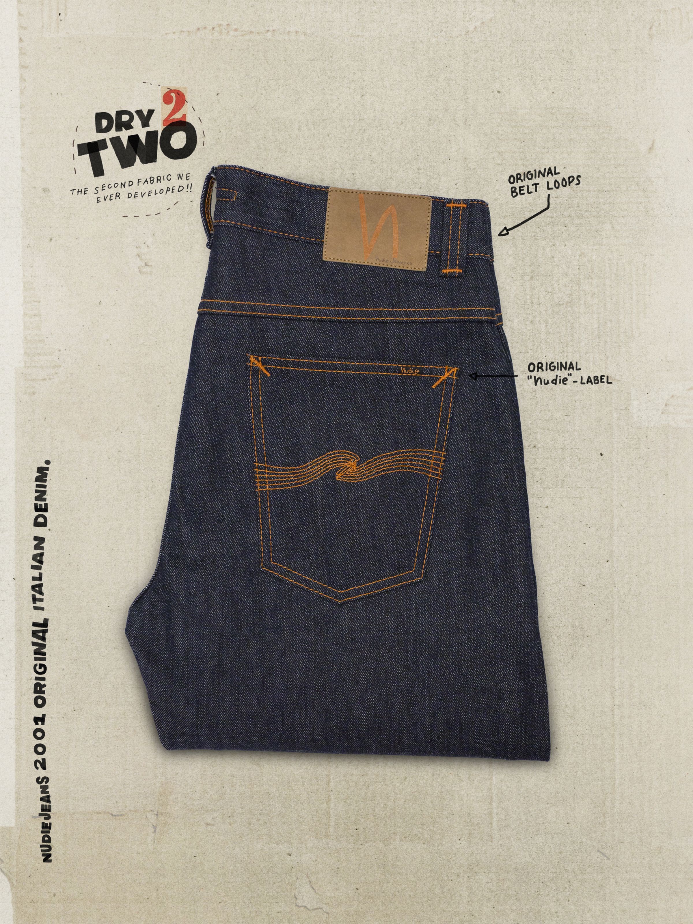 Slim Jim Dry Two jeans in indigo organic cotton rigid denim, showing the back pocket and signature orange stitching.