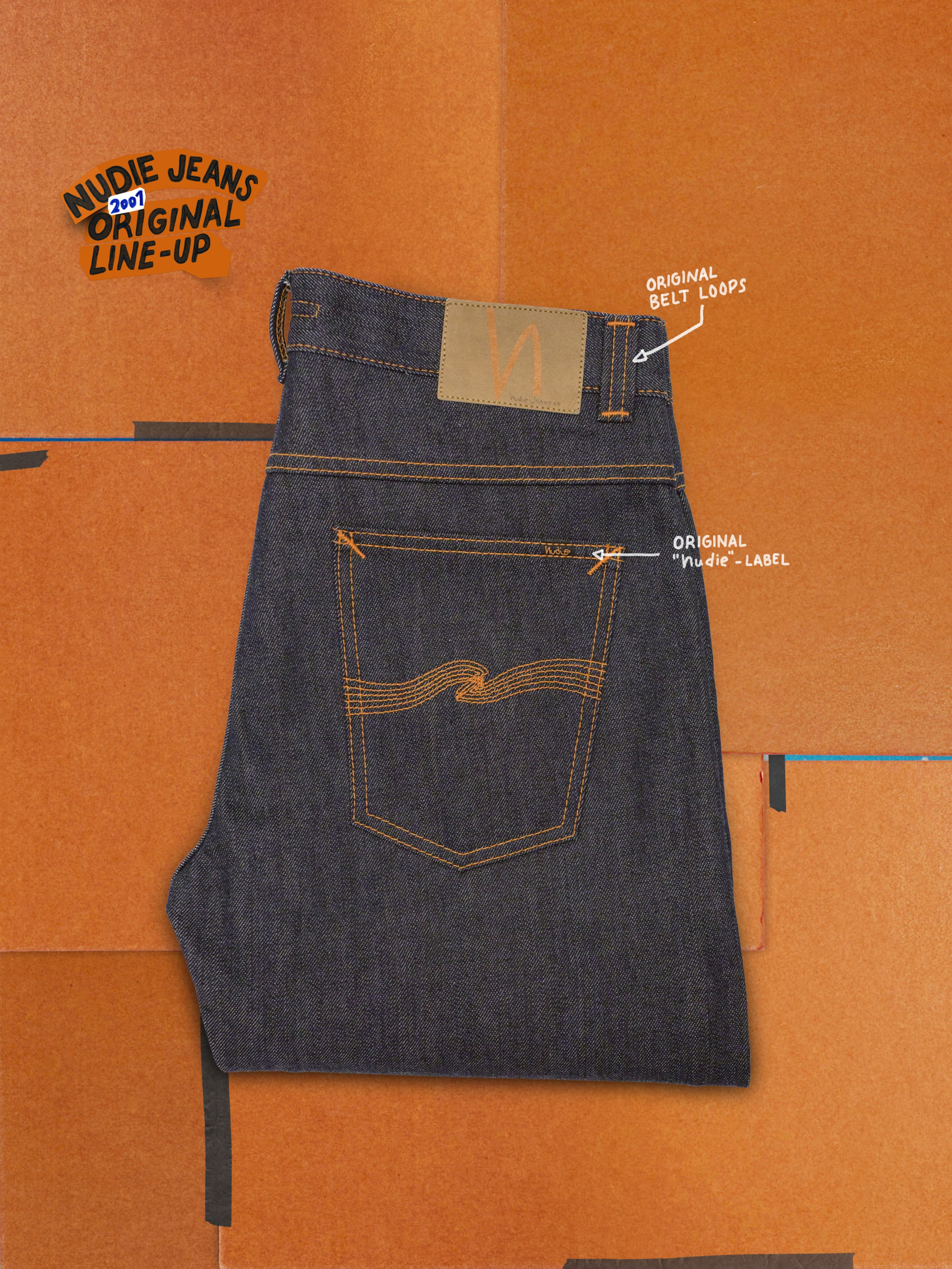 Nudie Jeans Slim Jim Dry Two, back pocket view with orange stitching and jacron patch from the original 2001 line-up.