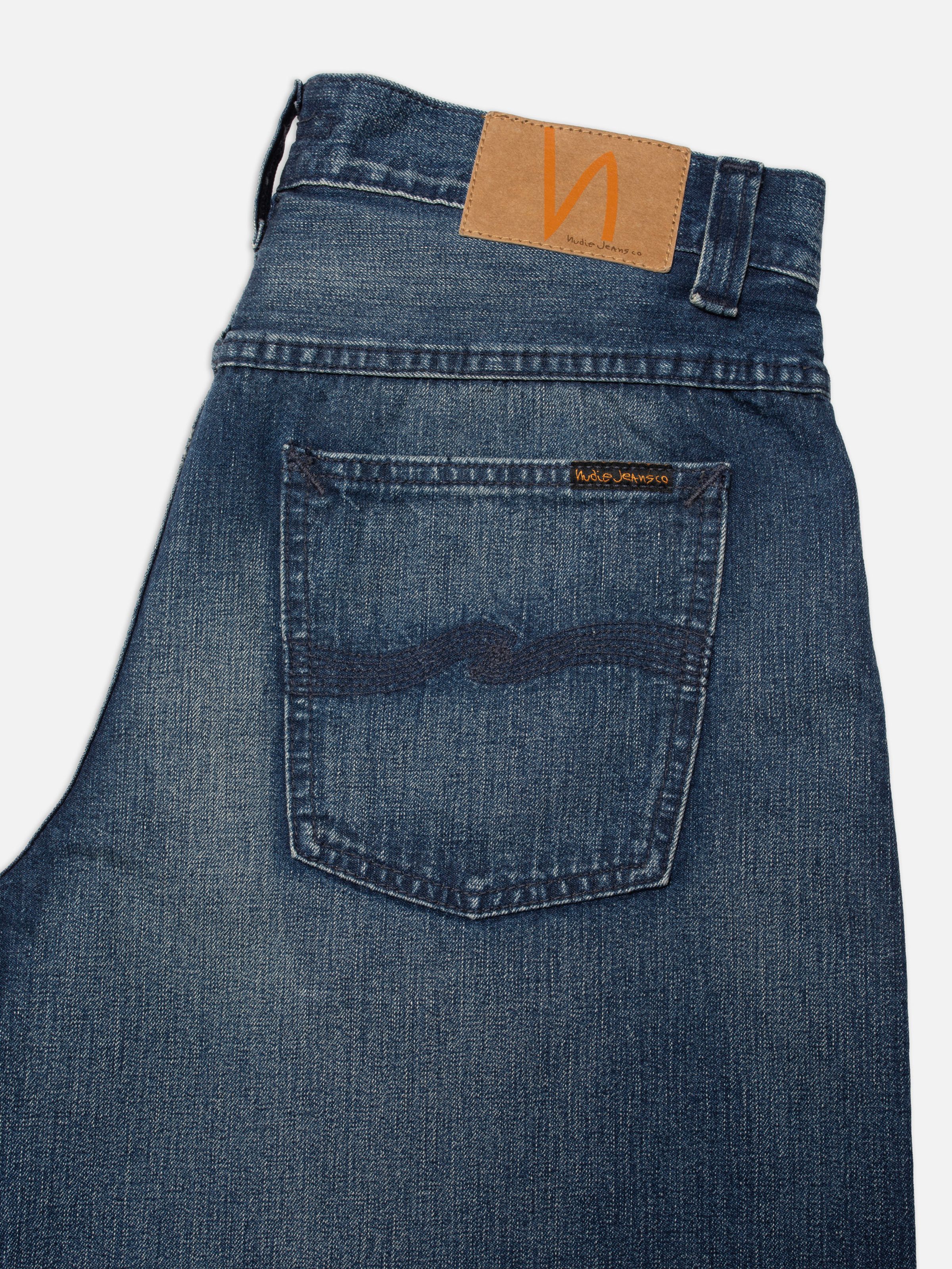 Nudie Jeans Zeb Denim Shorts Blue Painter, close-up of the back pocket with navy embroidery and jacron patch.