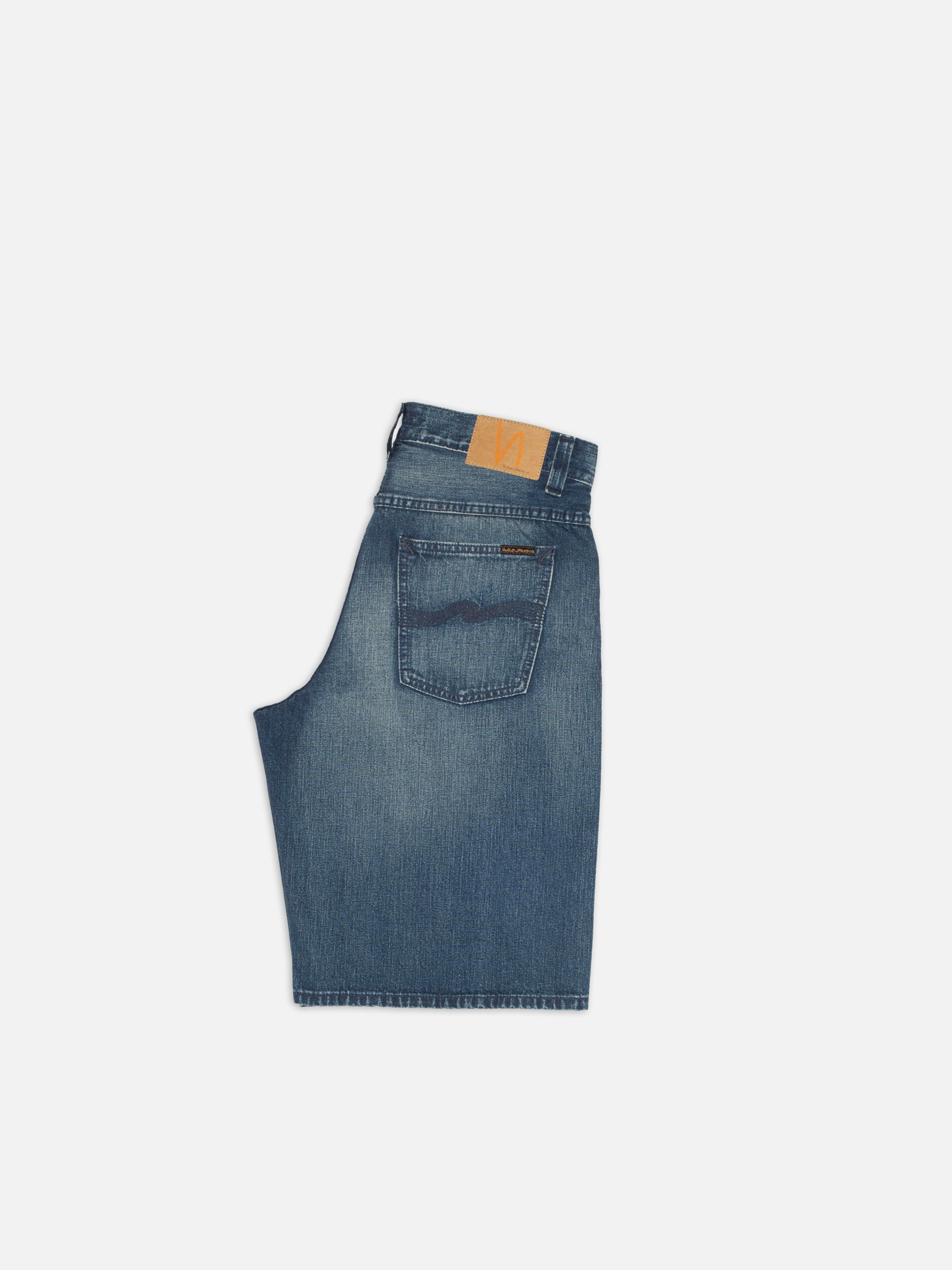 Nudie Jeans Zeb Denim Shorts Blue Painter, back view of the loose fit denim shorts against a white background.