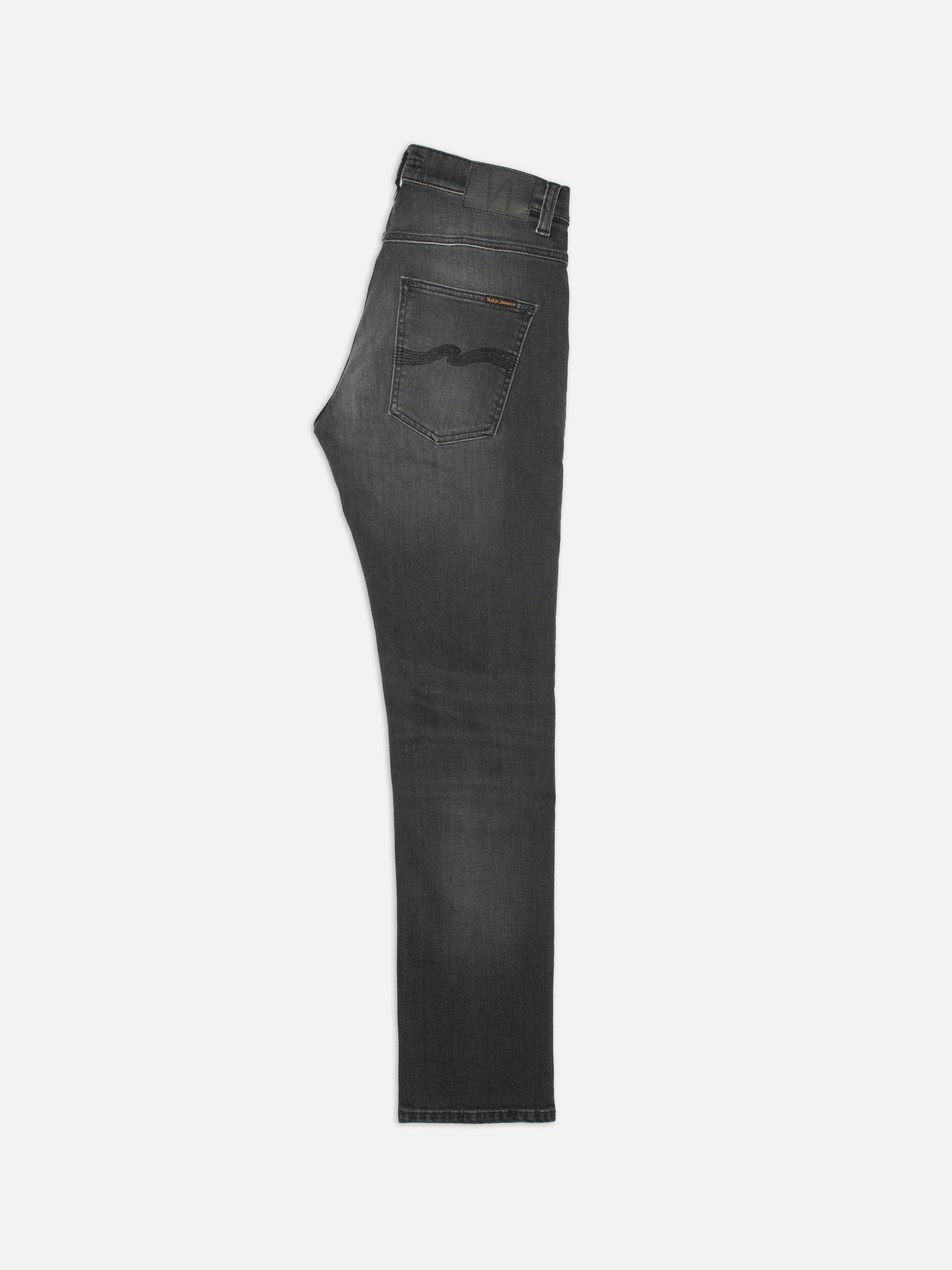 Nudie Jeans Grim Tim Black Mist, men's slim straight jeans, shown folded in a flat lay style.