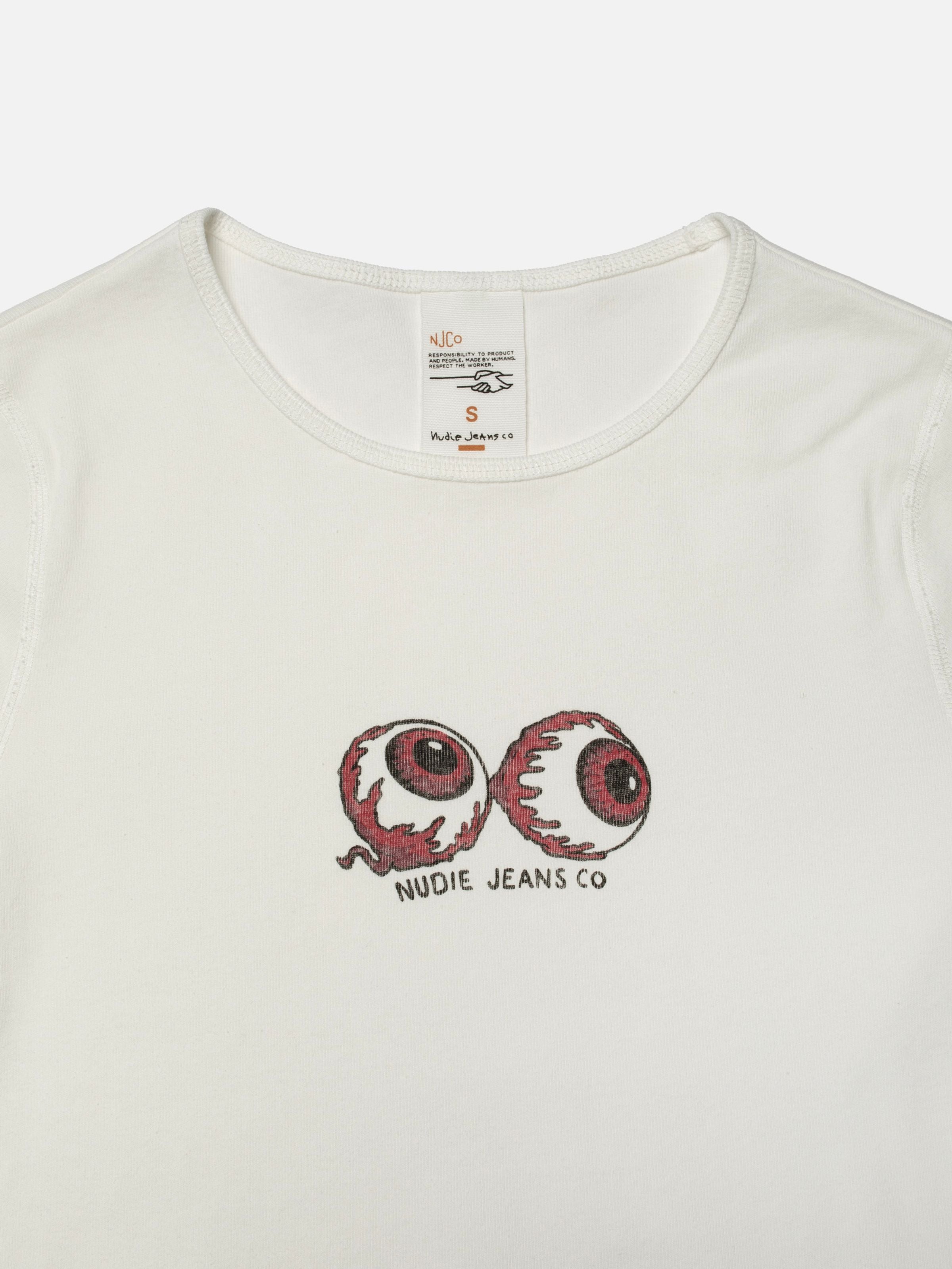 Nudie Jeans Eve T-Shirt Eyeballs Offwhite, close-up of the graphic print on slim-fit organic cotton rib knit.