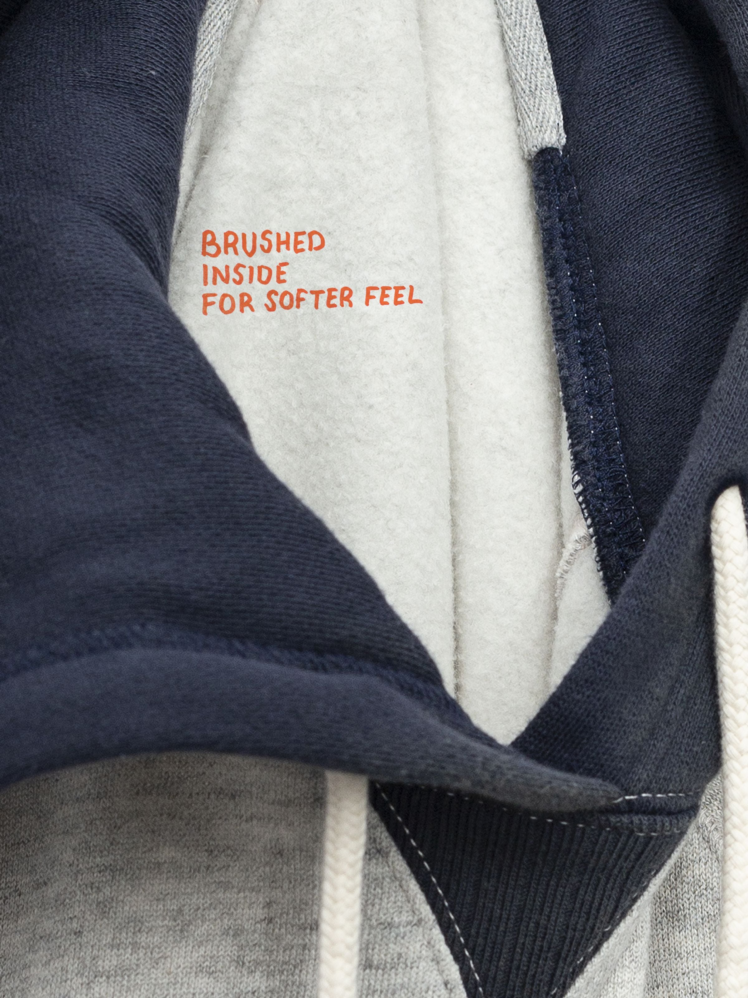 Nudie Jeans Gunde Hoodie in grey melange, highlighting the soft brushed organic cotton jersey interior.