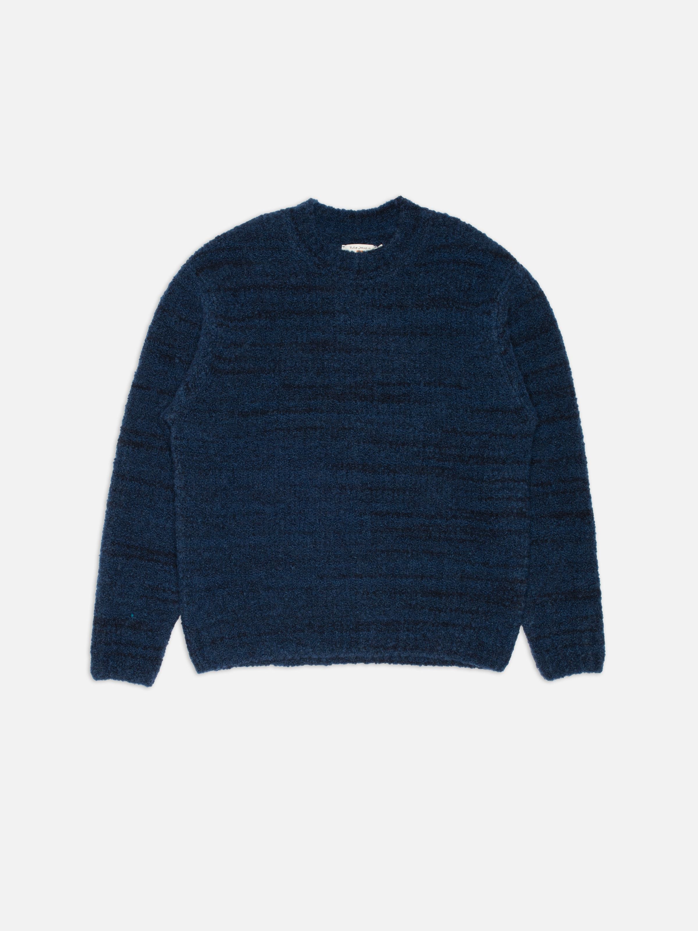 Nudie Jeans Gurra Boucle Sweater Multi, a blue organic wool blend crew neck knit sweater shown in a flat shot.