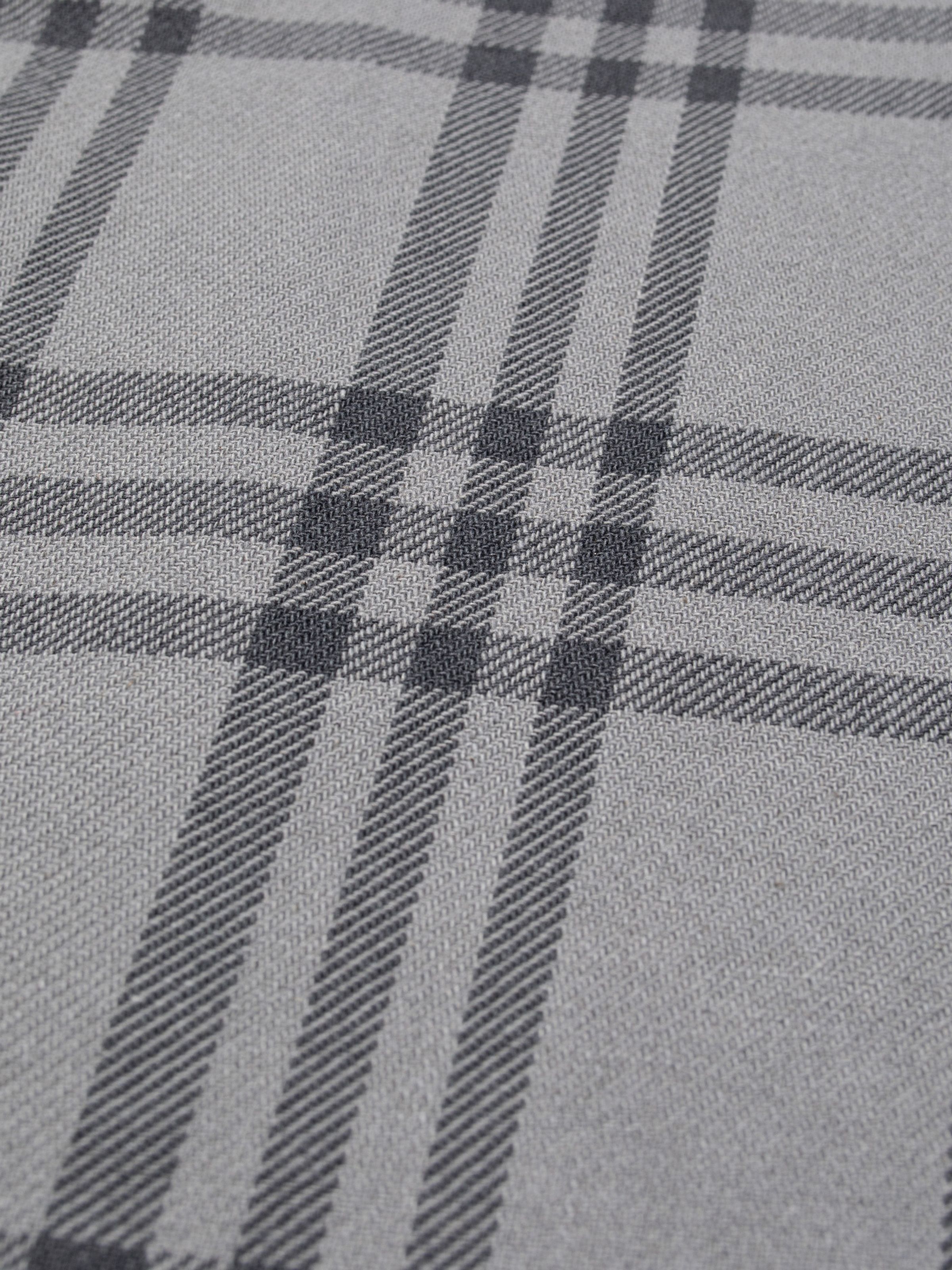 Nudie Jeans Julian Shirt Grey Check Multi, close-up of the organic cotton fabric showing the grey check pattern.