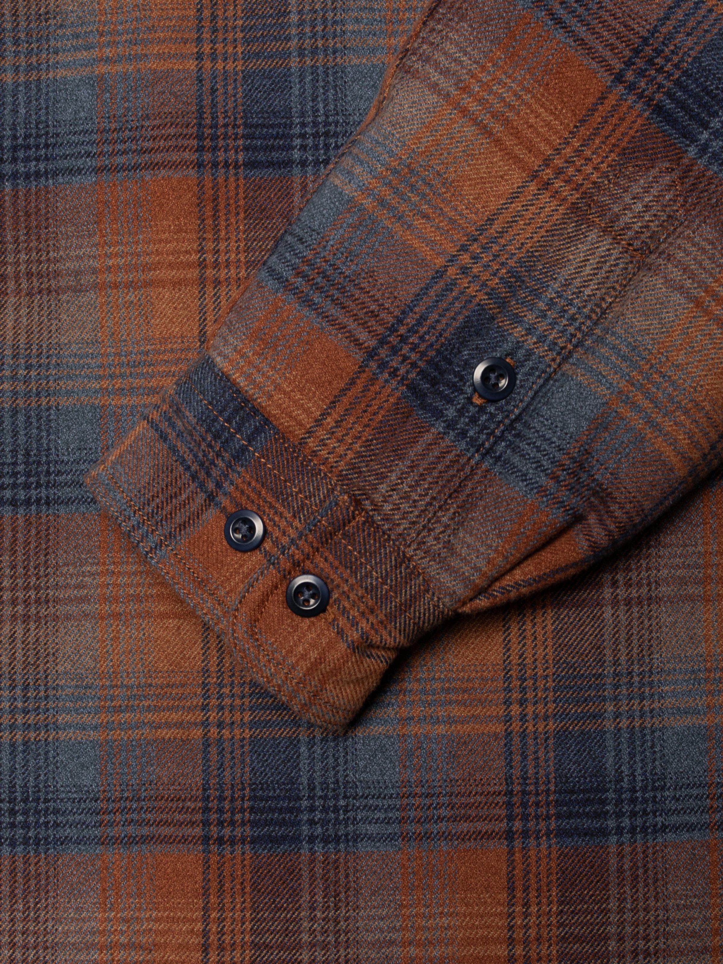 Nudie Jeans Glenn Padded Shirt Check Multi, close-up of the buttoned sleeve cuff in orange and blue organic cotton.