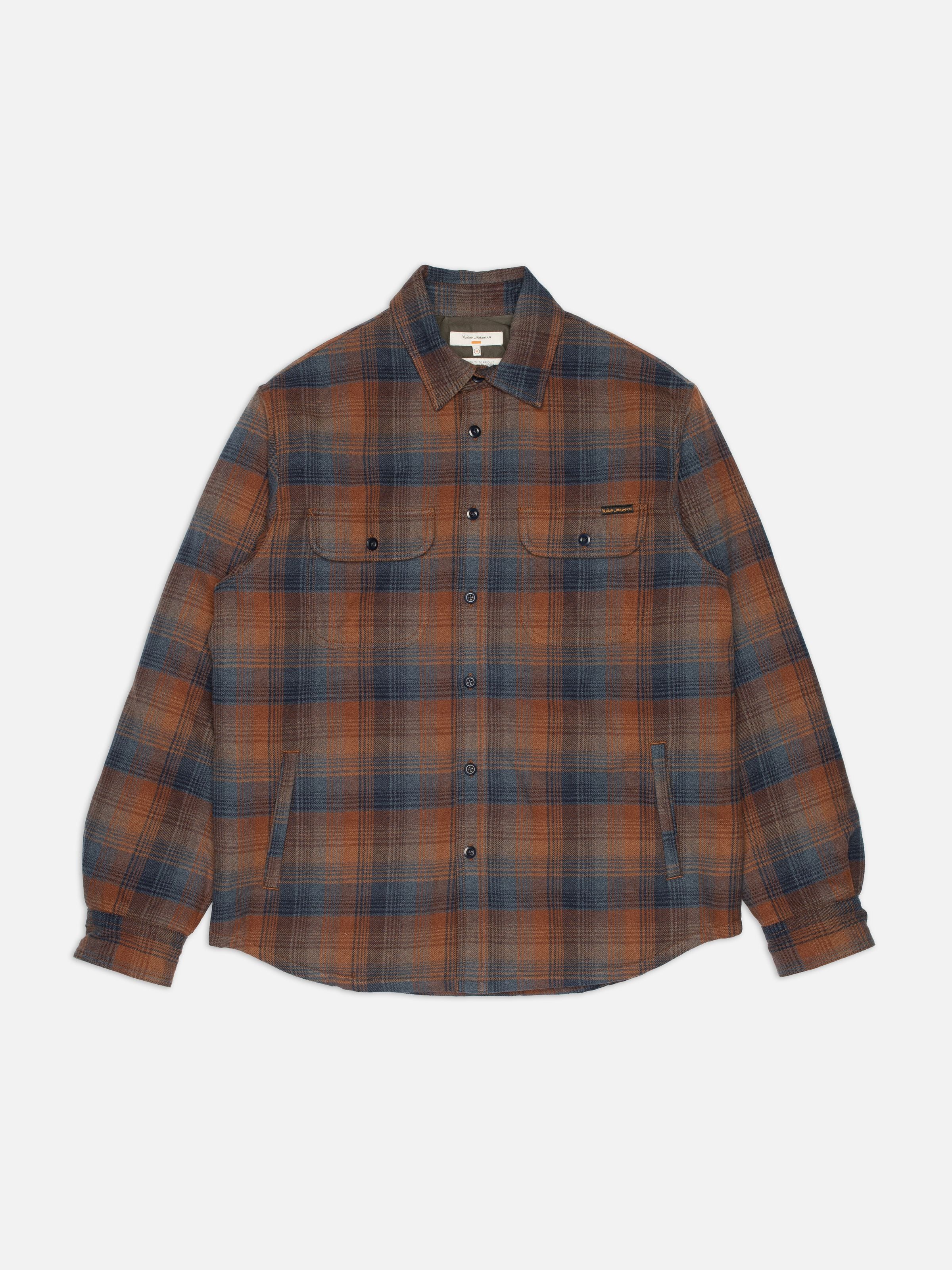 Nudie Jeans Glenn Padded Shirt Check Multi, a rust and blue organic cotton padded overshirt shown in a full flat shot.
