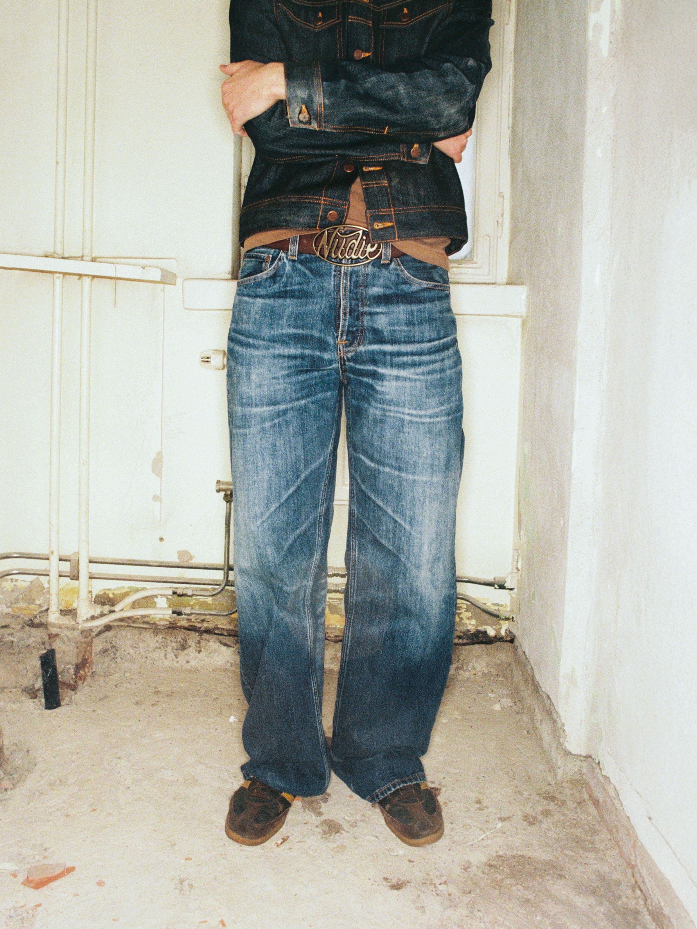 Nudie Jeans Loud Larry Muted Tracks, men's loose fit jeans shown from the front on a model.