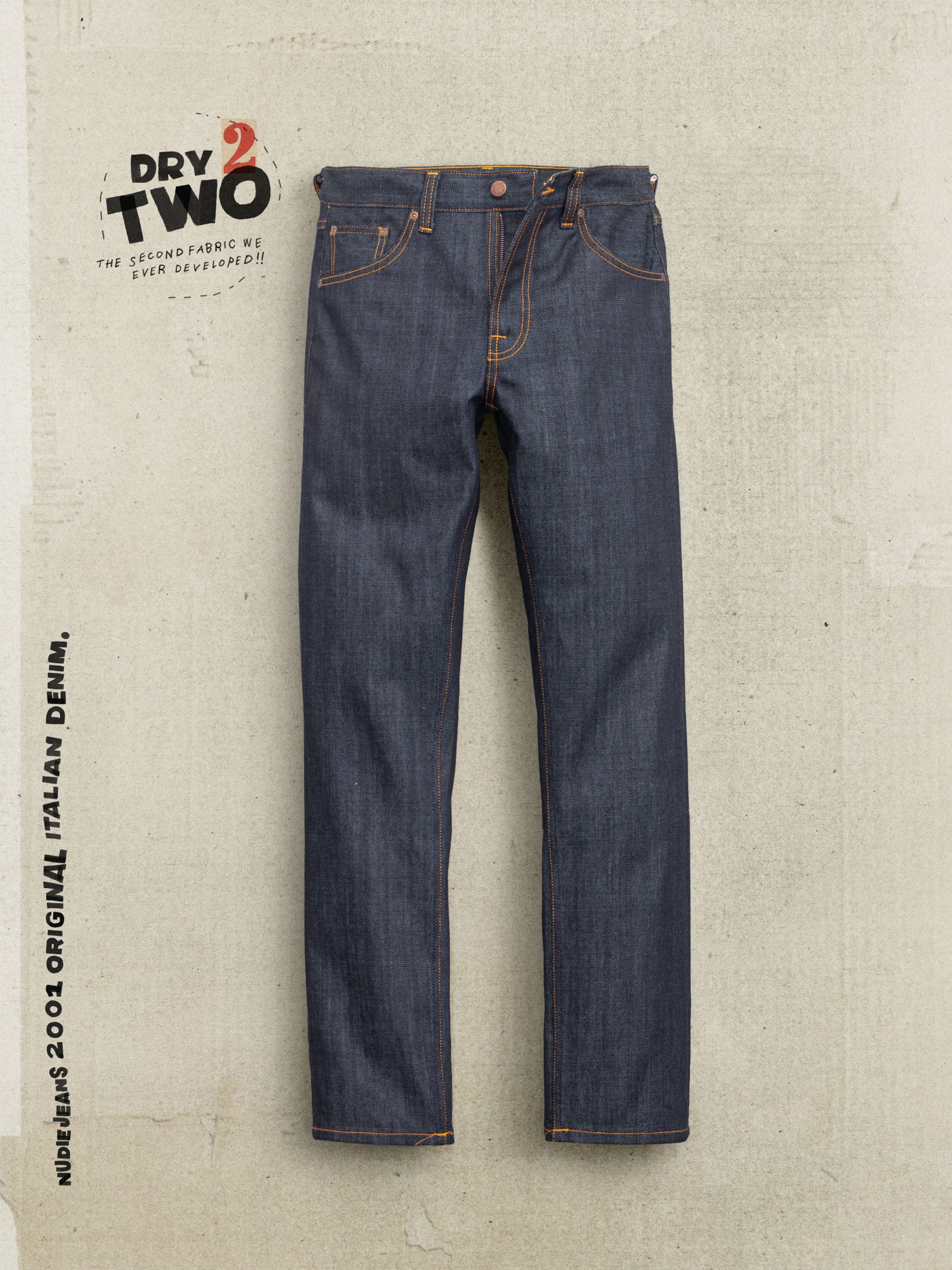 Nudie Jeans Gritty Jackson Blue Dry Two, regular fit straight leg jeans in dark indigo organic cotton denim, shown laid flat.