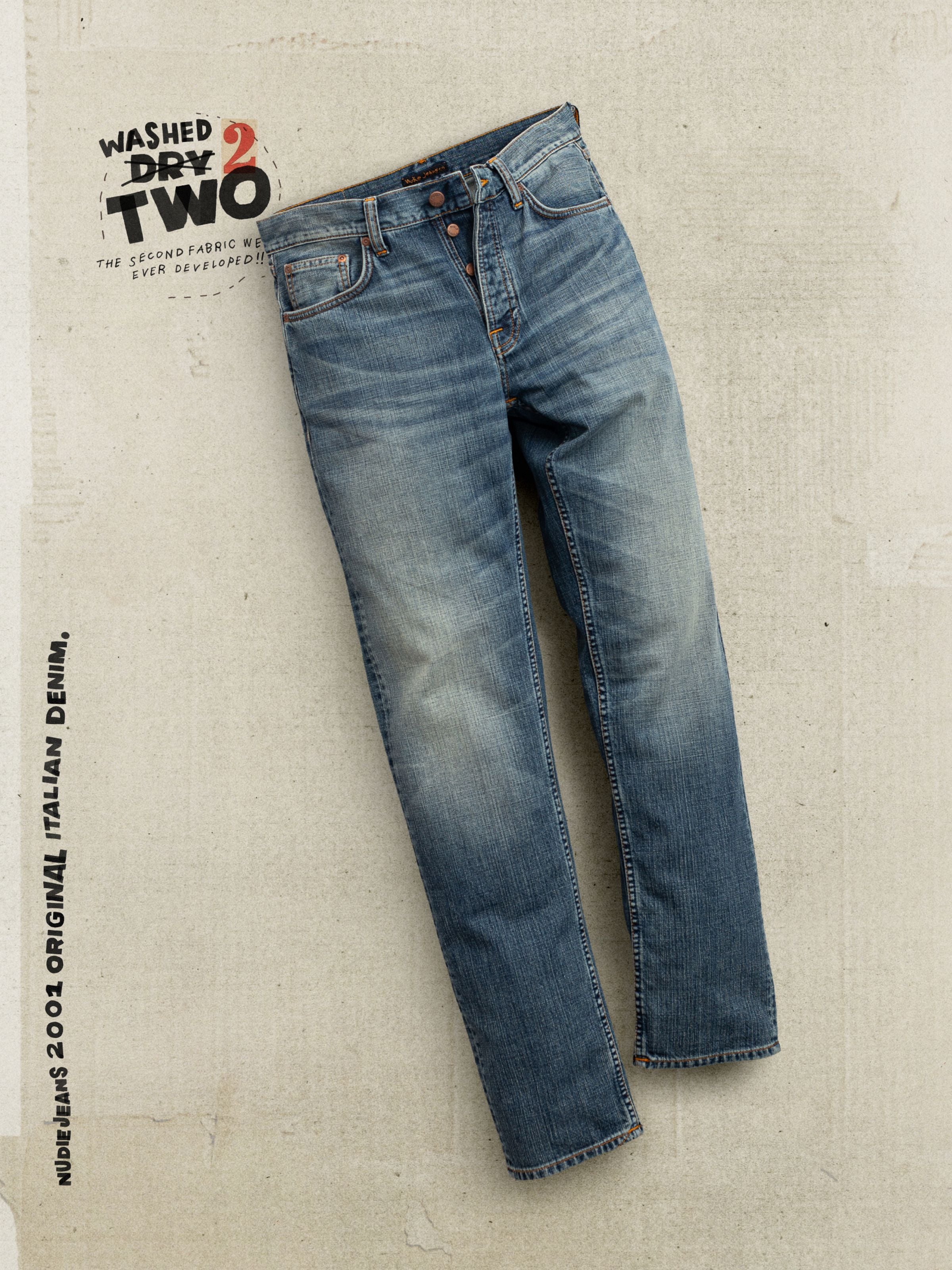 Nudie Jeans Rad Rufus Echoed Gold, regular straight fit organic cotton jeans in a mid-blue wash, shown in a flat lay.