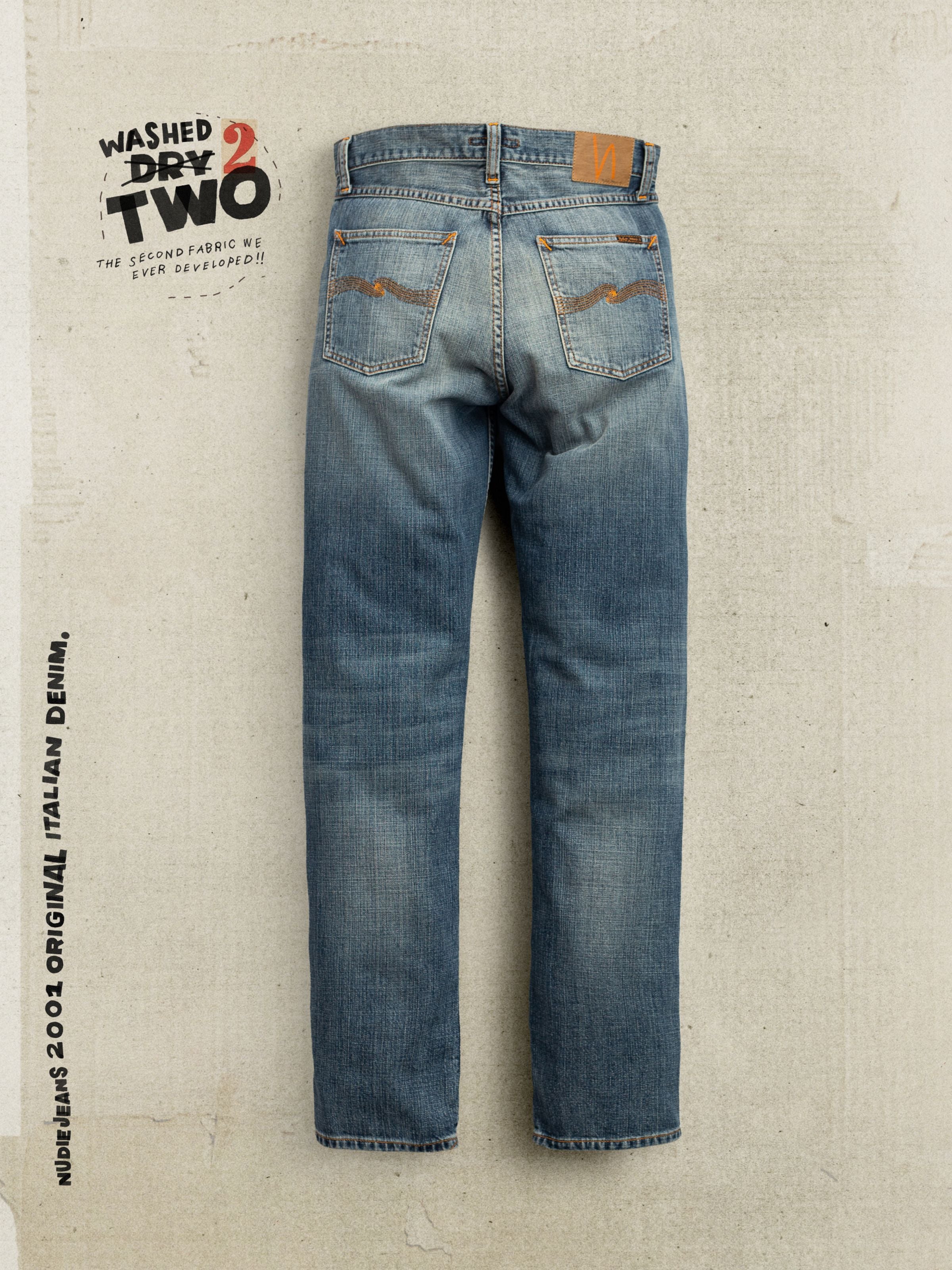 Nudie Jeans Rad Rufus Echoed Gold, men's regular fit straight leg jeans in mid-blue organic cotton rigid denim, back view.