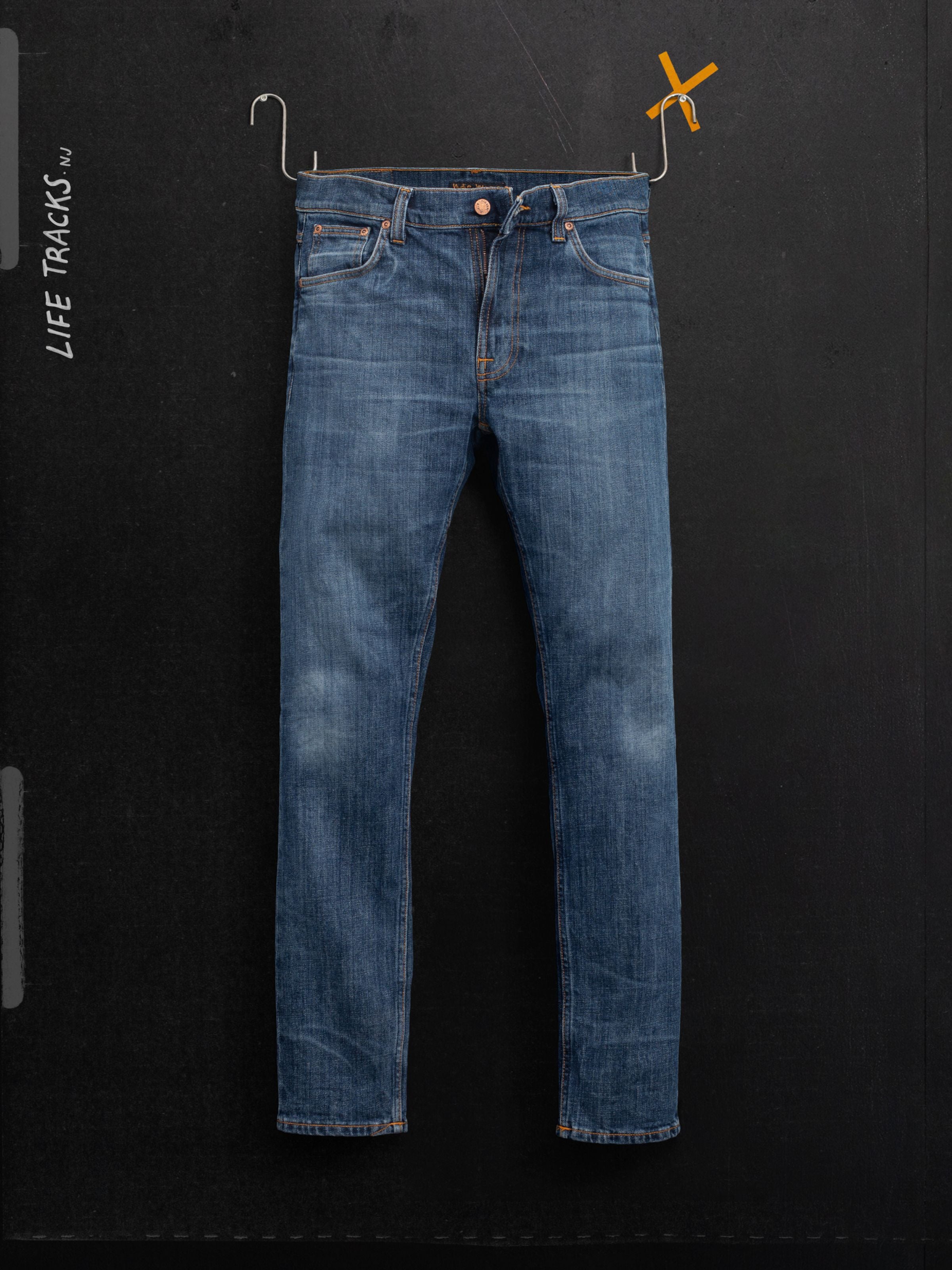 Nudie Jeans Lean Dean Echo Tracks, slim tapered fit jeans in washed dark blue organic cotton stretch denim, front view.