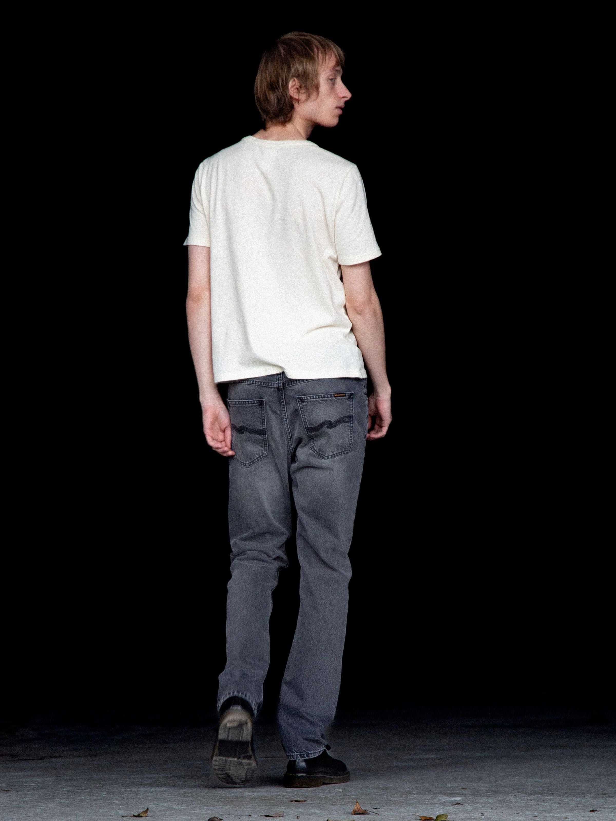 Nudie Jeans Gritty Jackson Grey Lake, regular fit straight leg organic cotton jeans shown from the back on a model.
