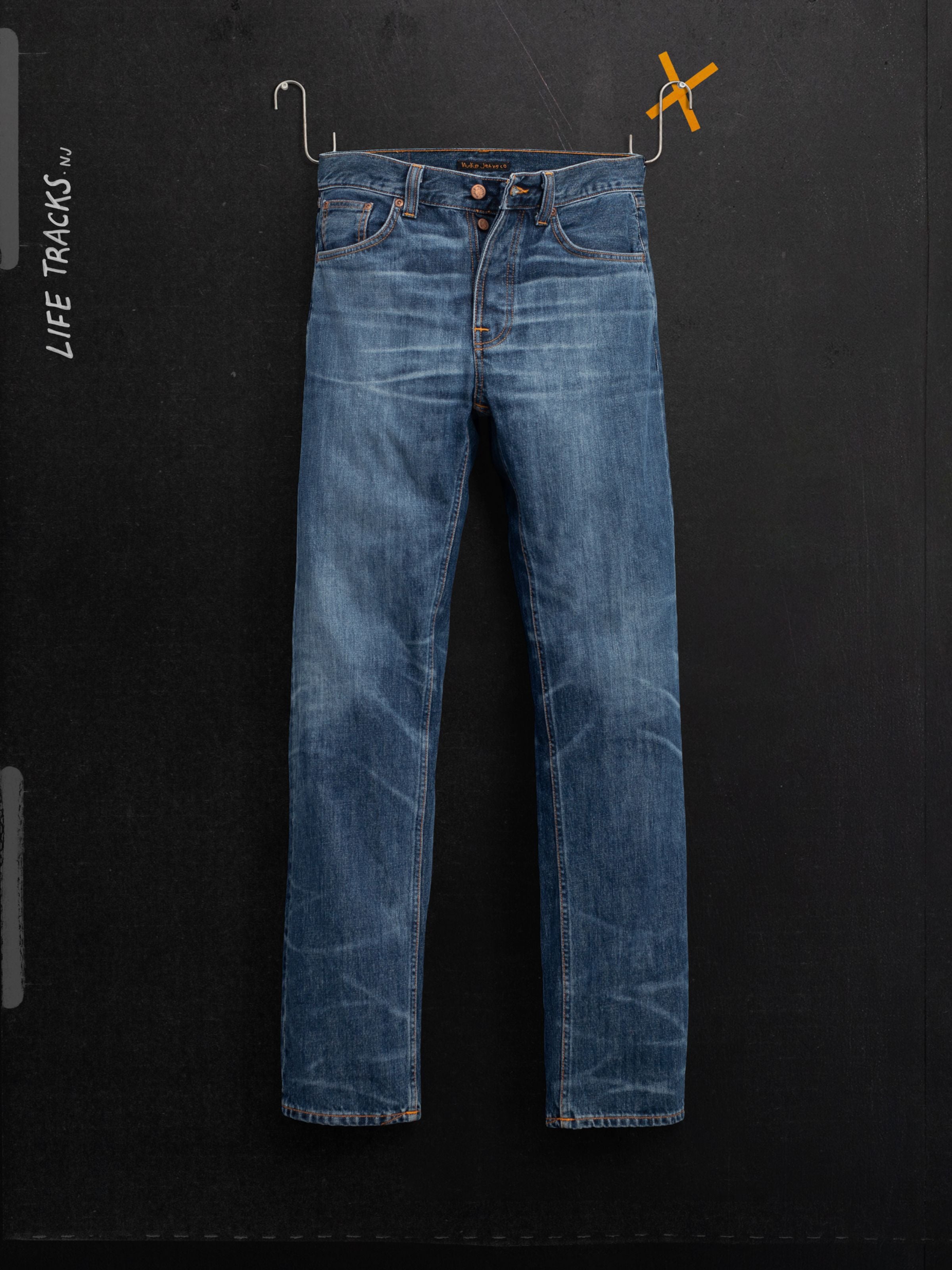 Nudie Jeans Rad Rufus Blue Twisted Tracks, regular fit straight leg jeans in a washed indigo organic cotton denim.