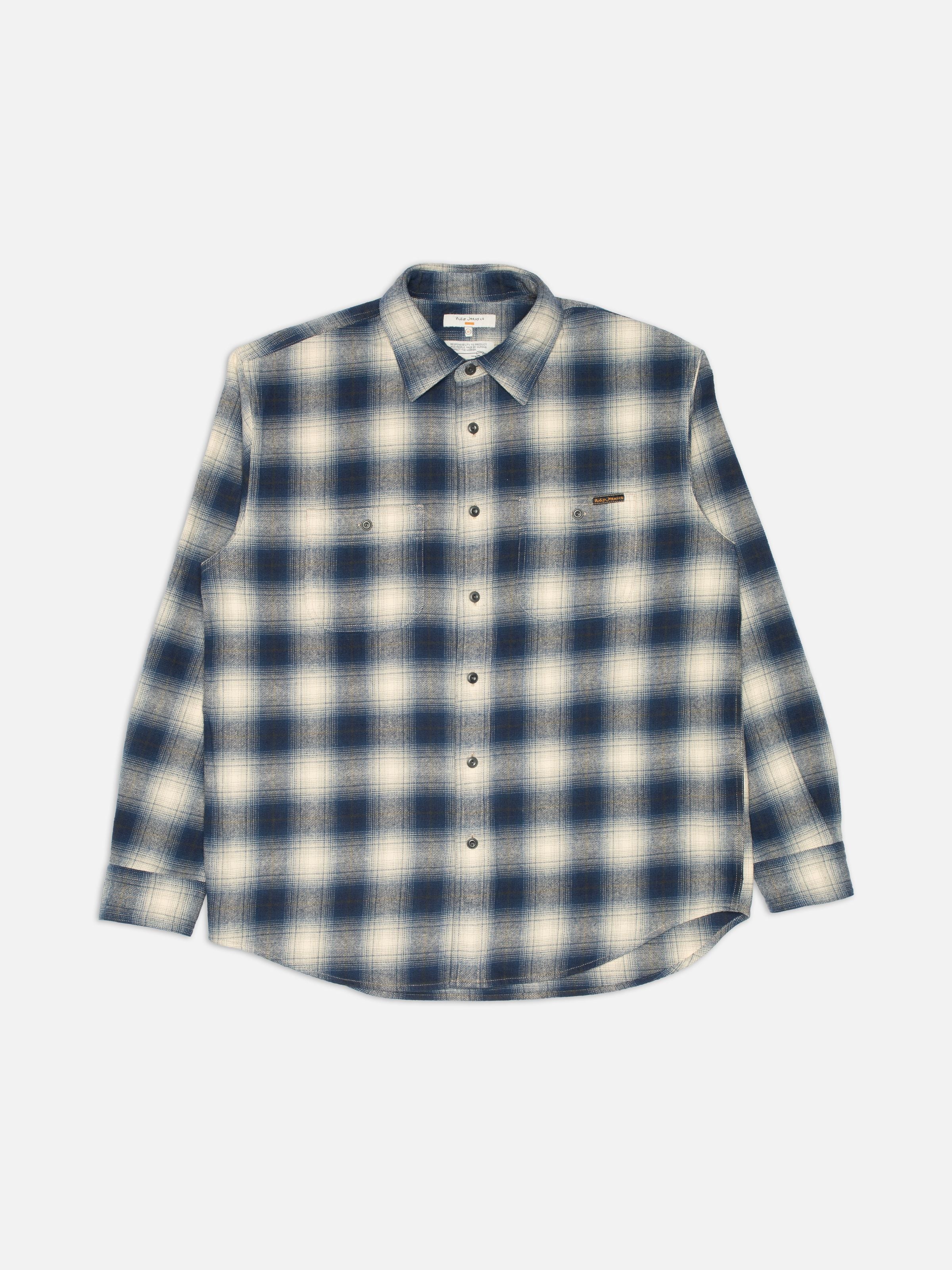Nudie Jeans Julian Worker Shirt Checked Blue, an organic cotton worker shirt featuring a blue and cream check, flatshot.
