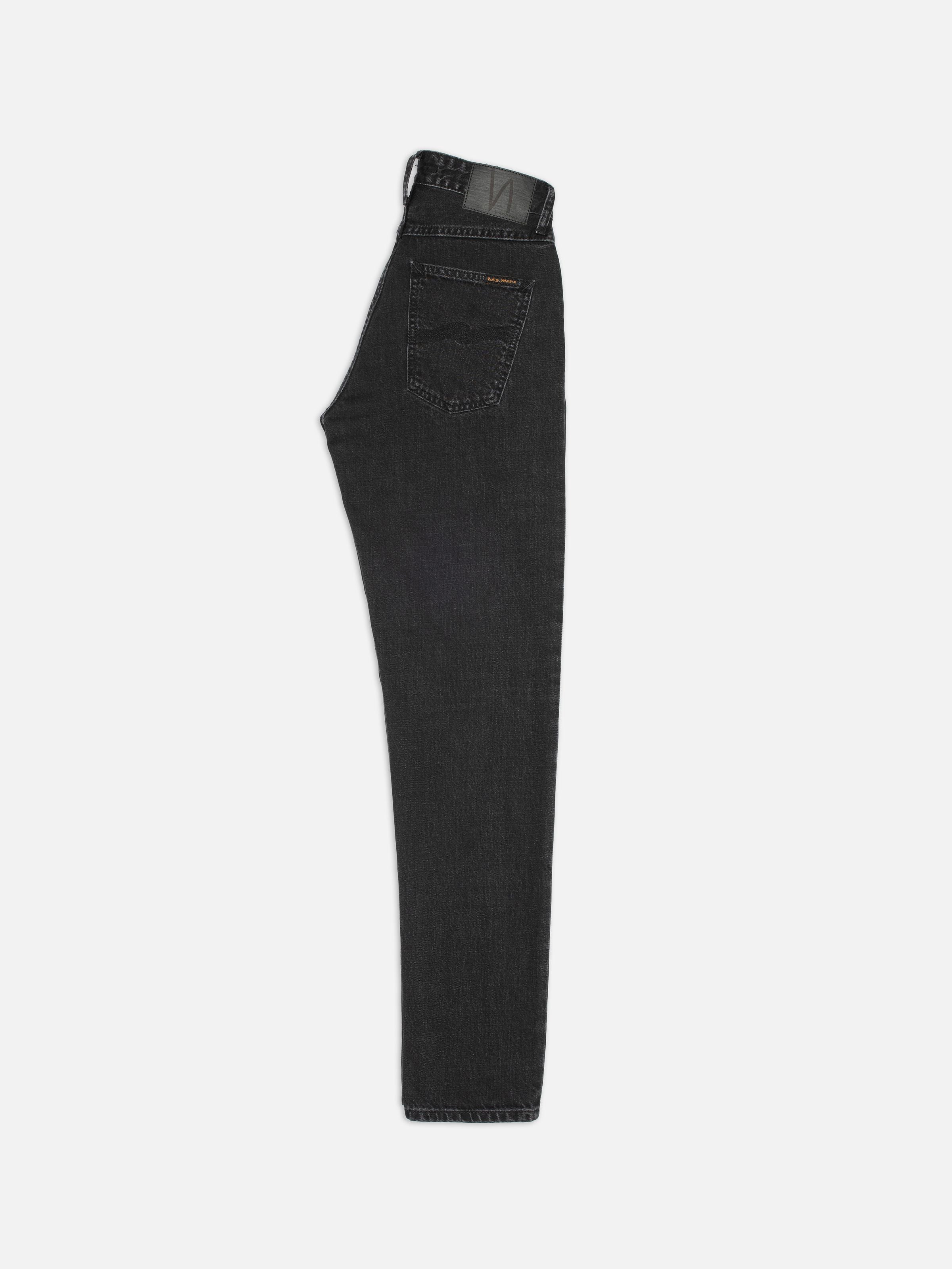 Nudie Jeans Breezy Britt Friendly Black, high-waist tapered jeans in washed black organic cotton, shown in side profile.
