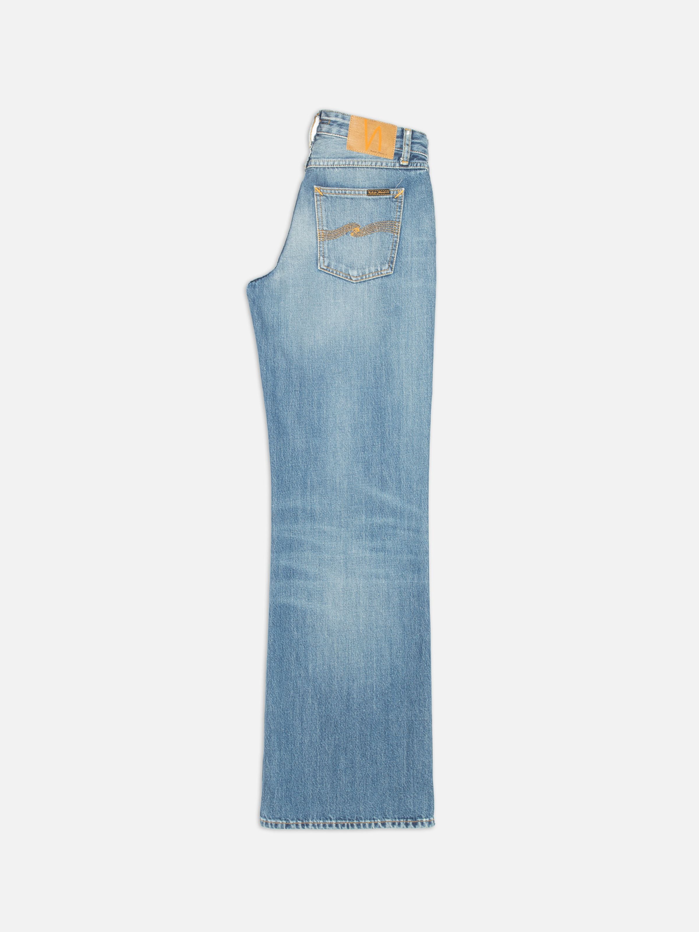 Nudie Jeans Wide Heidi Gravel Stone, wide-leg organic cotton jeans in a mid-blue wash, side view on a white background.