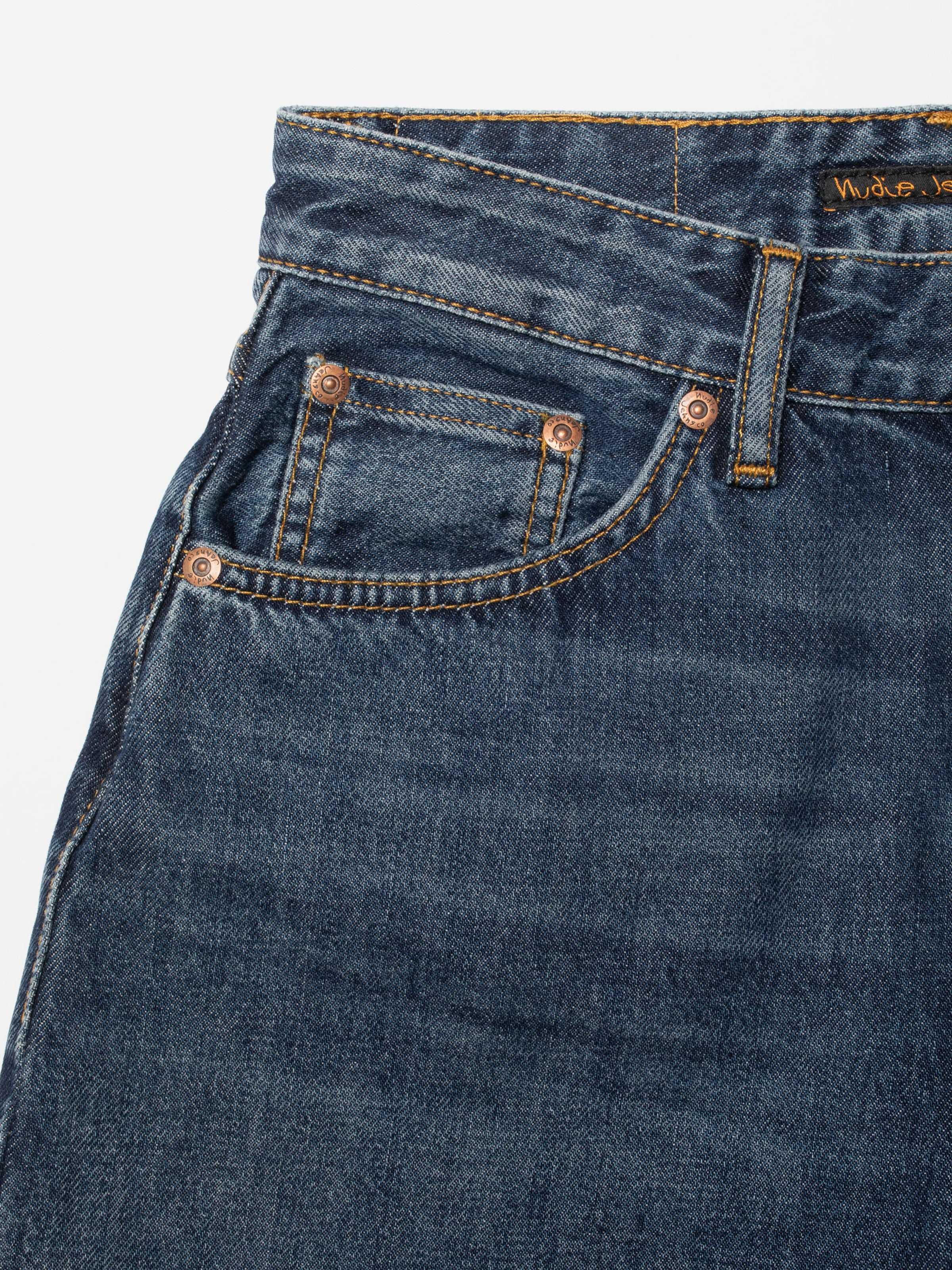 Nudie Jeans Clean Eileen Midnight Rain, front pocket detail with copper rivets and tobacco threads on organic cotton denim.