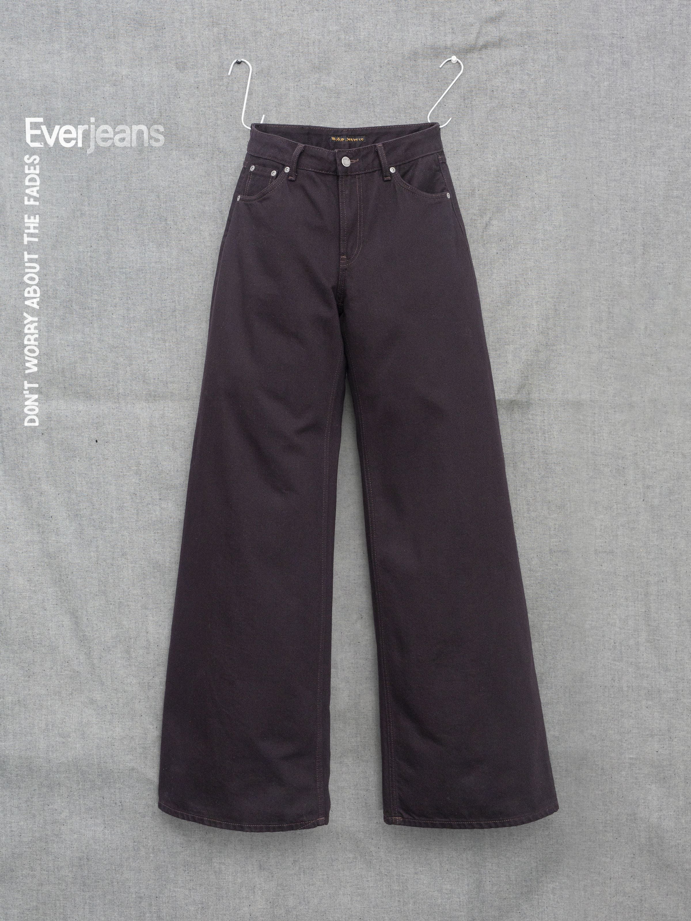 Nudie Jeans Sonic Sue Everbrown, women's wide leg loose fit jeans in deep brown organic cotton rigid denim, laid flat.