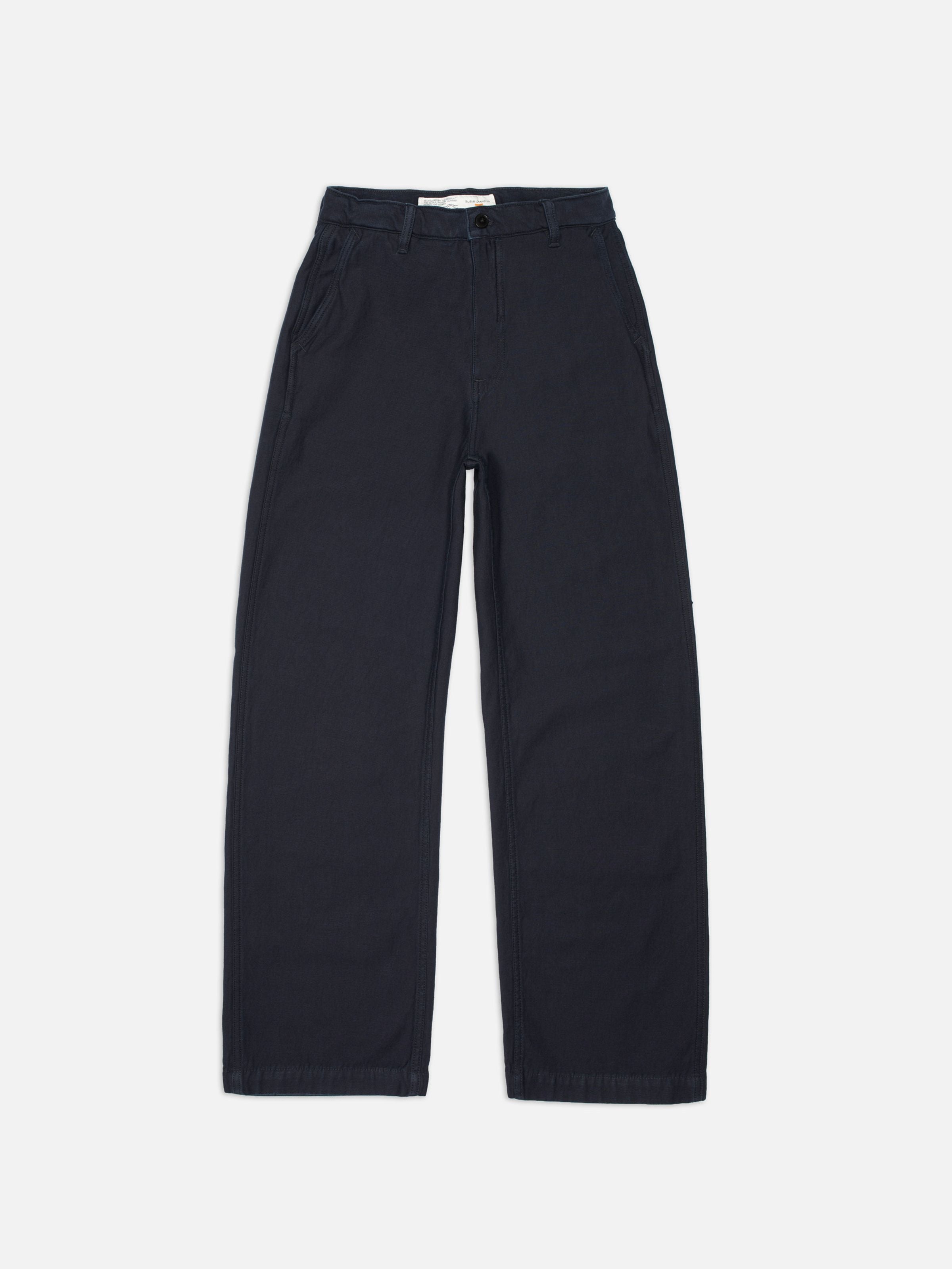 Nudie Jeans Wendy Pants Back Sateen Indigo, weit geschnittene Hose aus Bio-Baumwolle in dunklem Indigo, flach liegend.