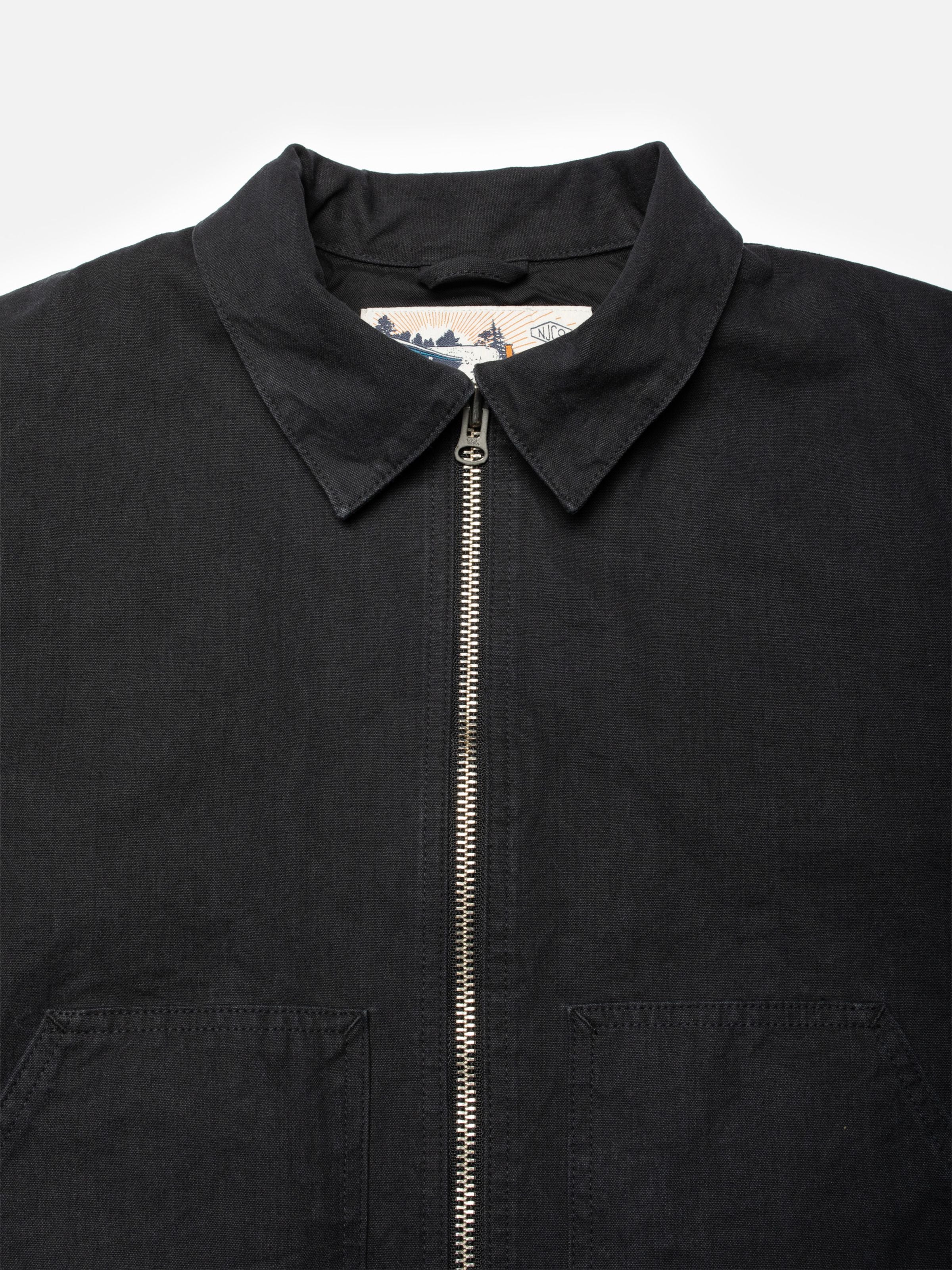 Nudie Jeans Lana Jacket Duck Canvas Black, close-up of the collar and zipper on durable organic cotton duck canvas.