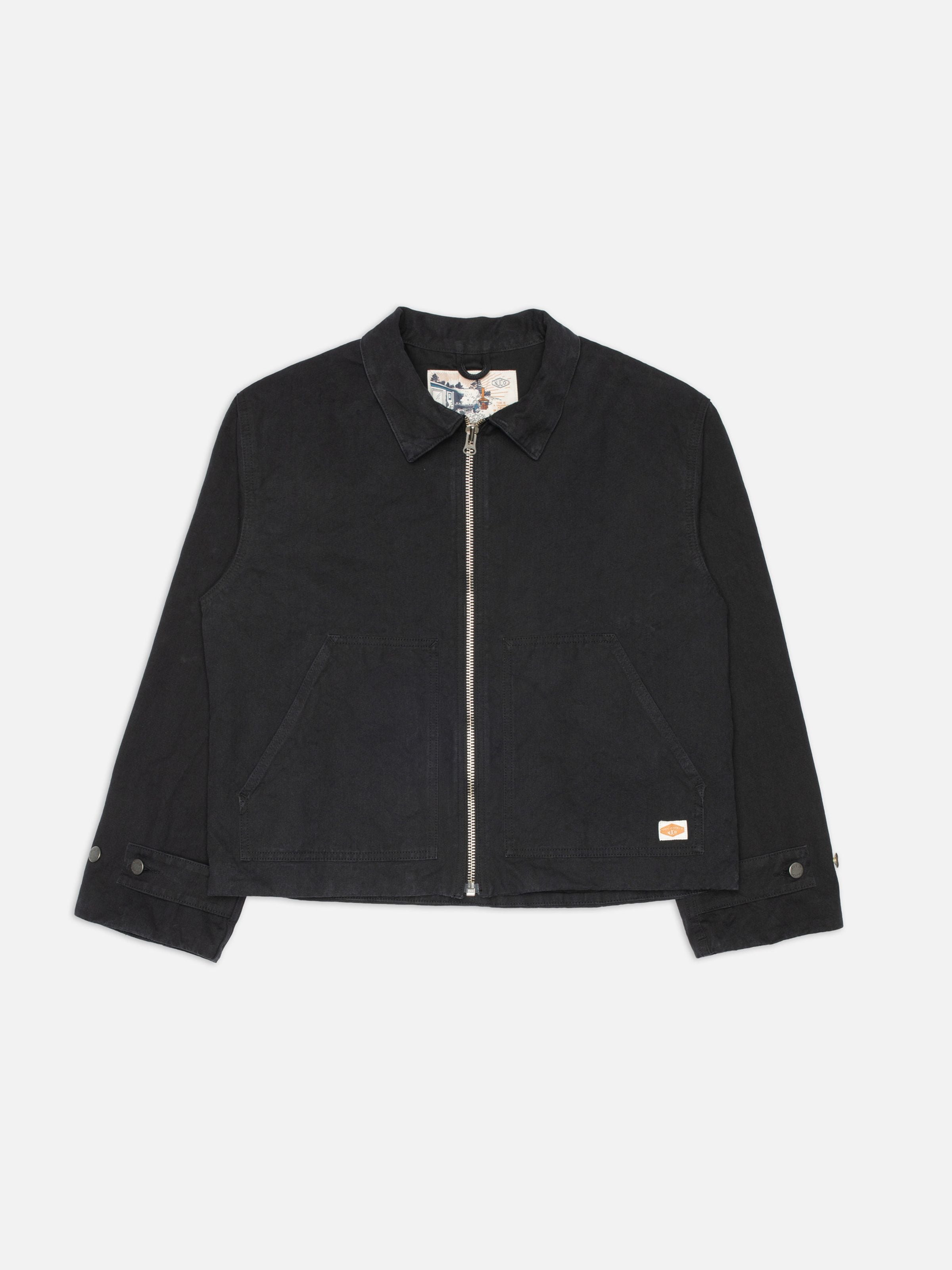 Nudie Jeans Lana Jacket Duck Canvas Black, a boxy organic cotton zip-up jacket with patch pockets shown flat.