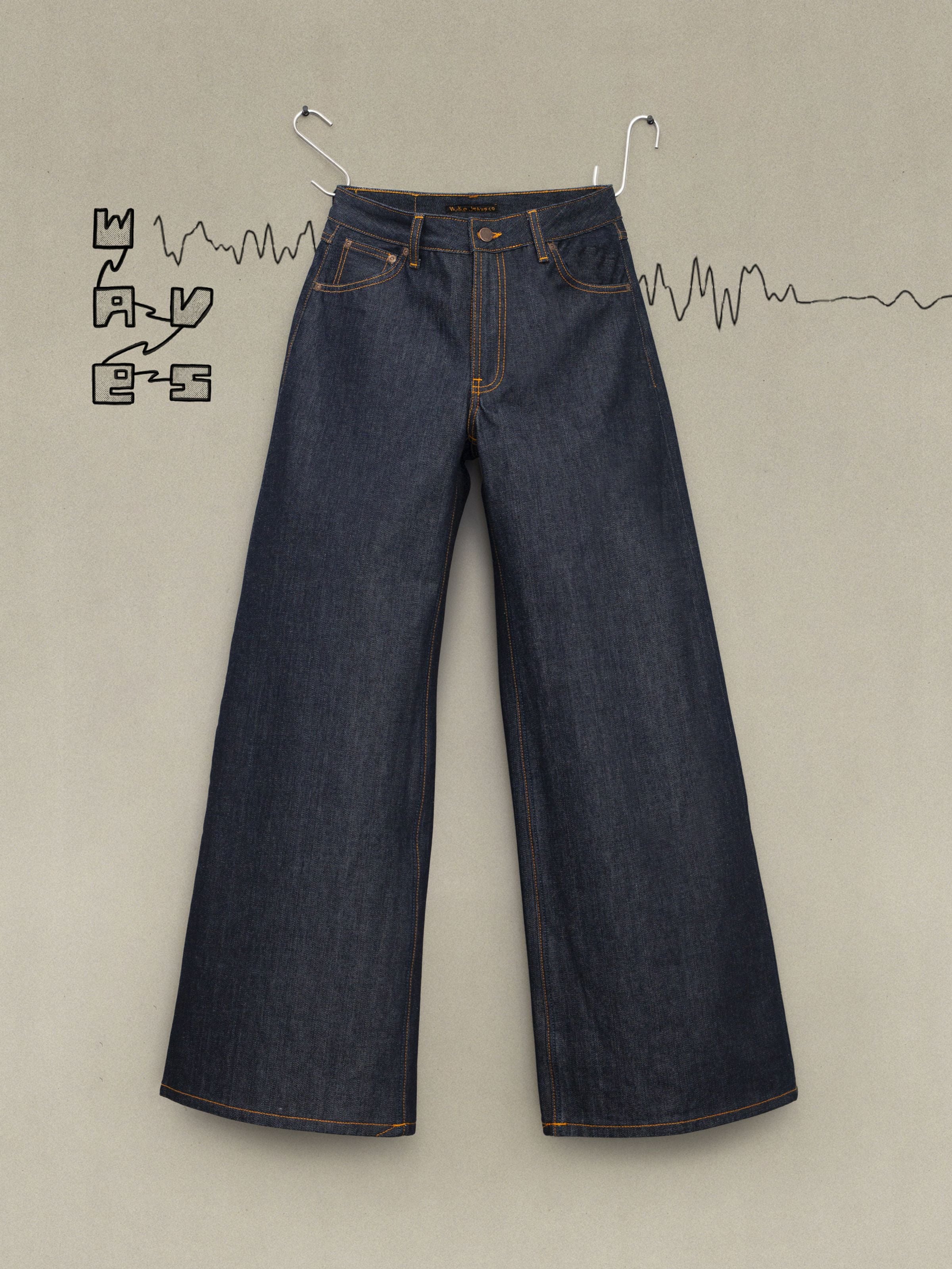 Nudie Jeans Sonic Sue Dry Ecru Waves, women's loose-fit wide-leg jeans in rigid organic cotton denim, shown laid flat.