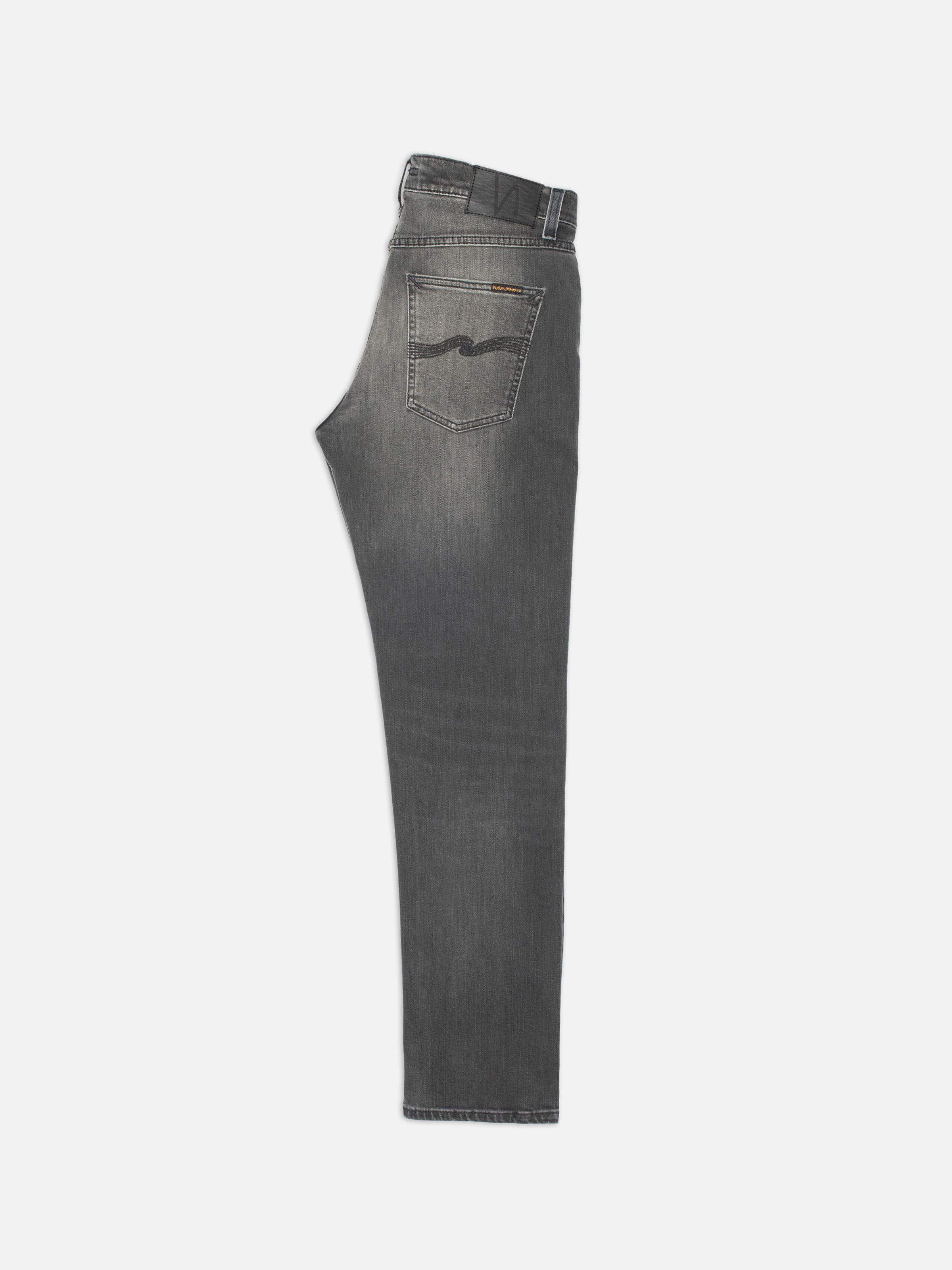 Nudie Jeans Solid Ollie Black Mist, mid-gray slim straight organic cotton comfort stretch jeans shown from the side.