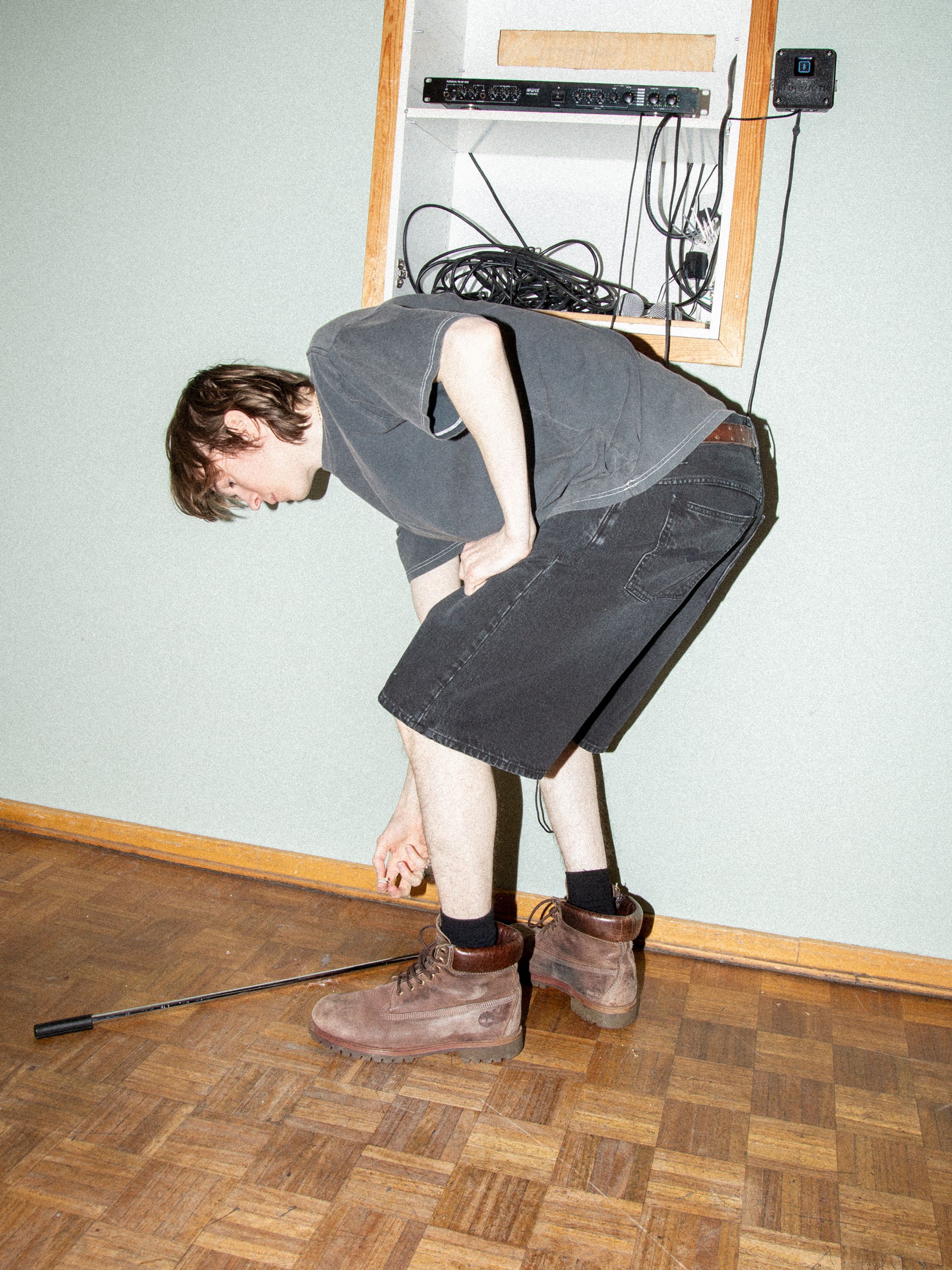 Nudie Jeans Zeb Denim Shorts Night Dune, men's loose-fit wide-leg black denim shorts shown on a model.