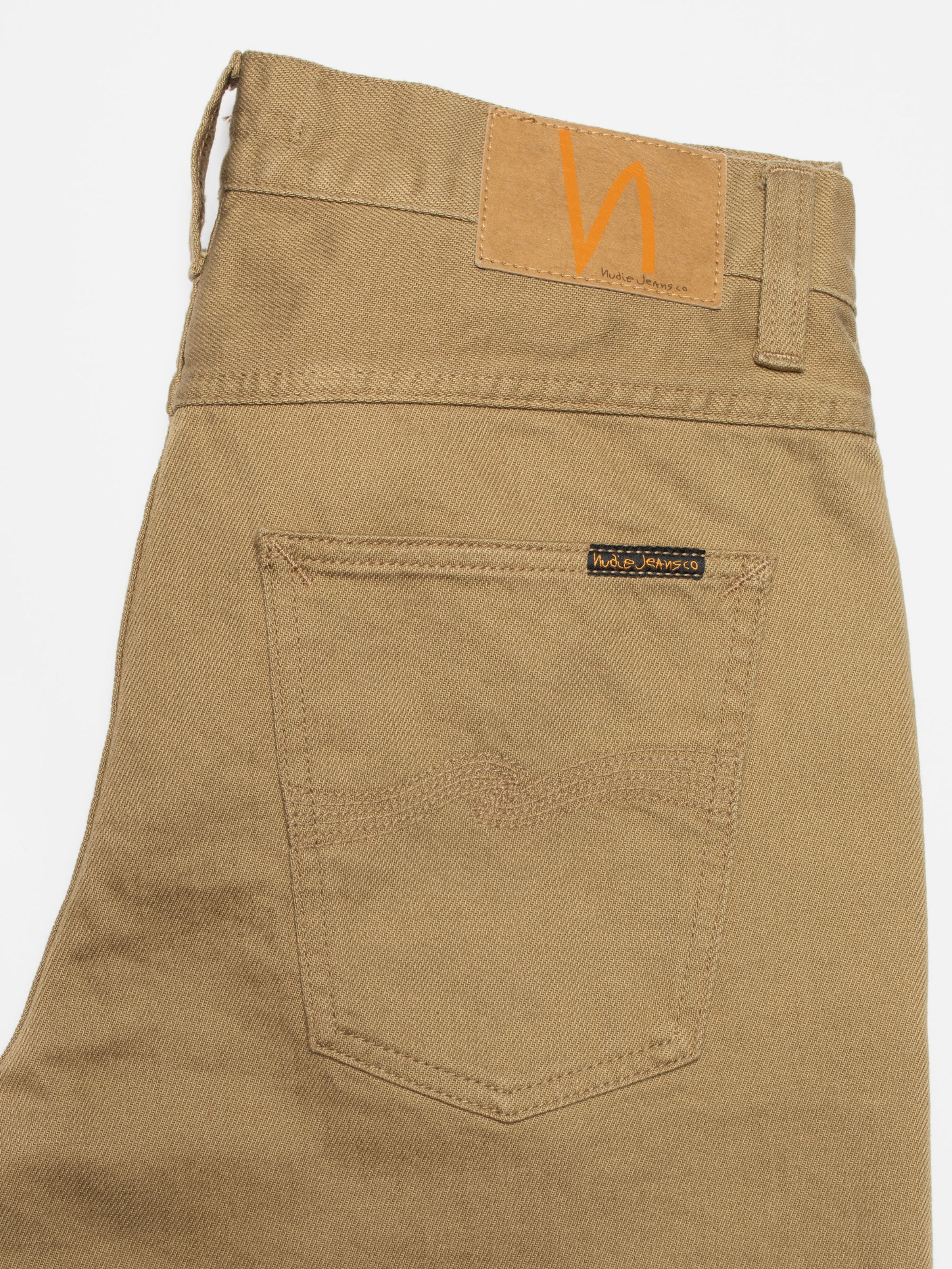 Nudie Jeans Flare Glenn Everlion, flare fit jeans, showing a close-up of the back pocket and jacron patch.