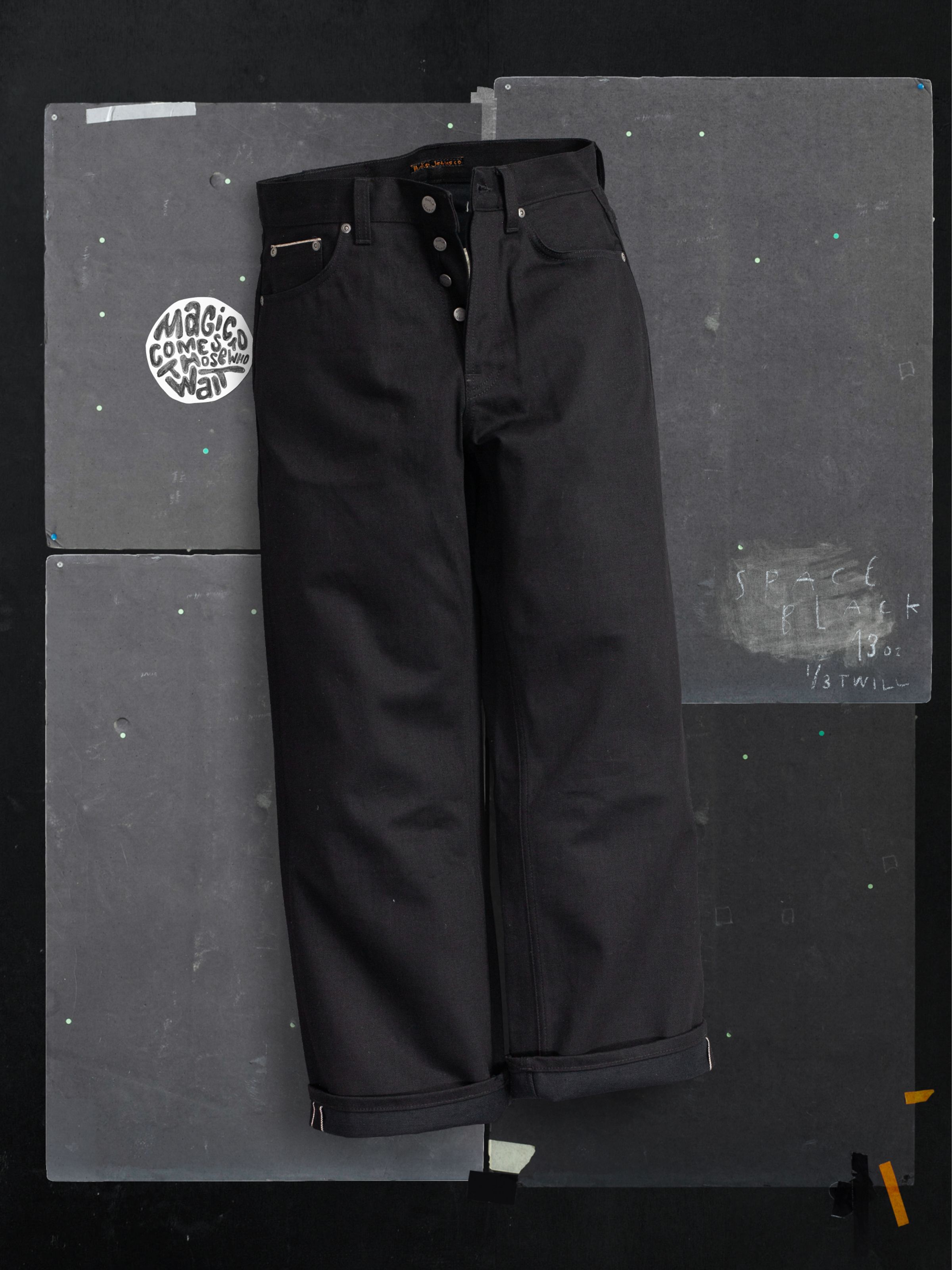Nudie Jeans Loud Larry Space Black Selvage, men's loose-fit wide-leg jeans in rigid selvedge denim, front flatshot.