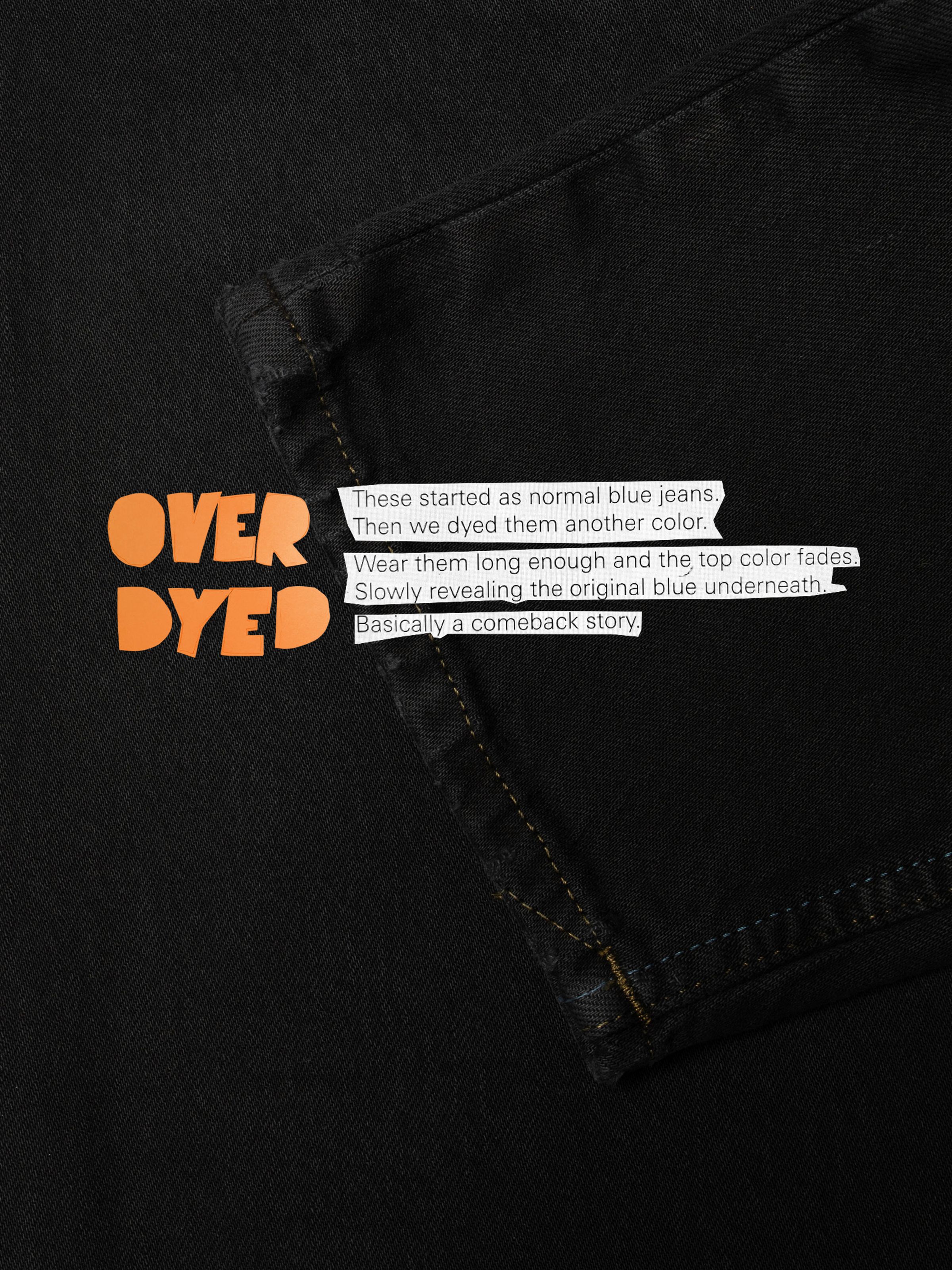 Nudie Jeans Solid Ollie Petrol Black, close-up of overdyed denim with text explaining the garment dyeing process.