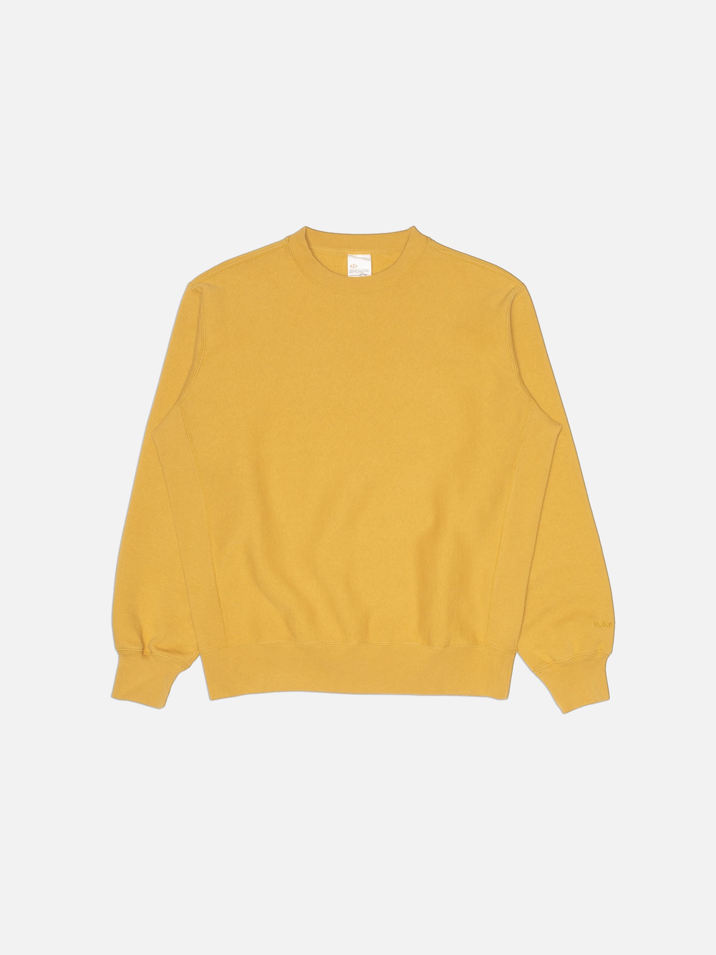Nudie Jeans Hasse Crew Neck Sweatshirt in Old Yellow, shown in a full flat shot against a light background.