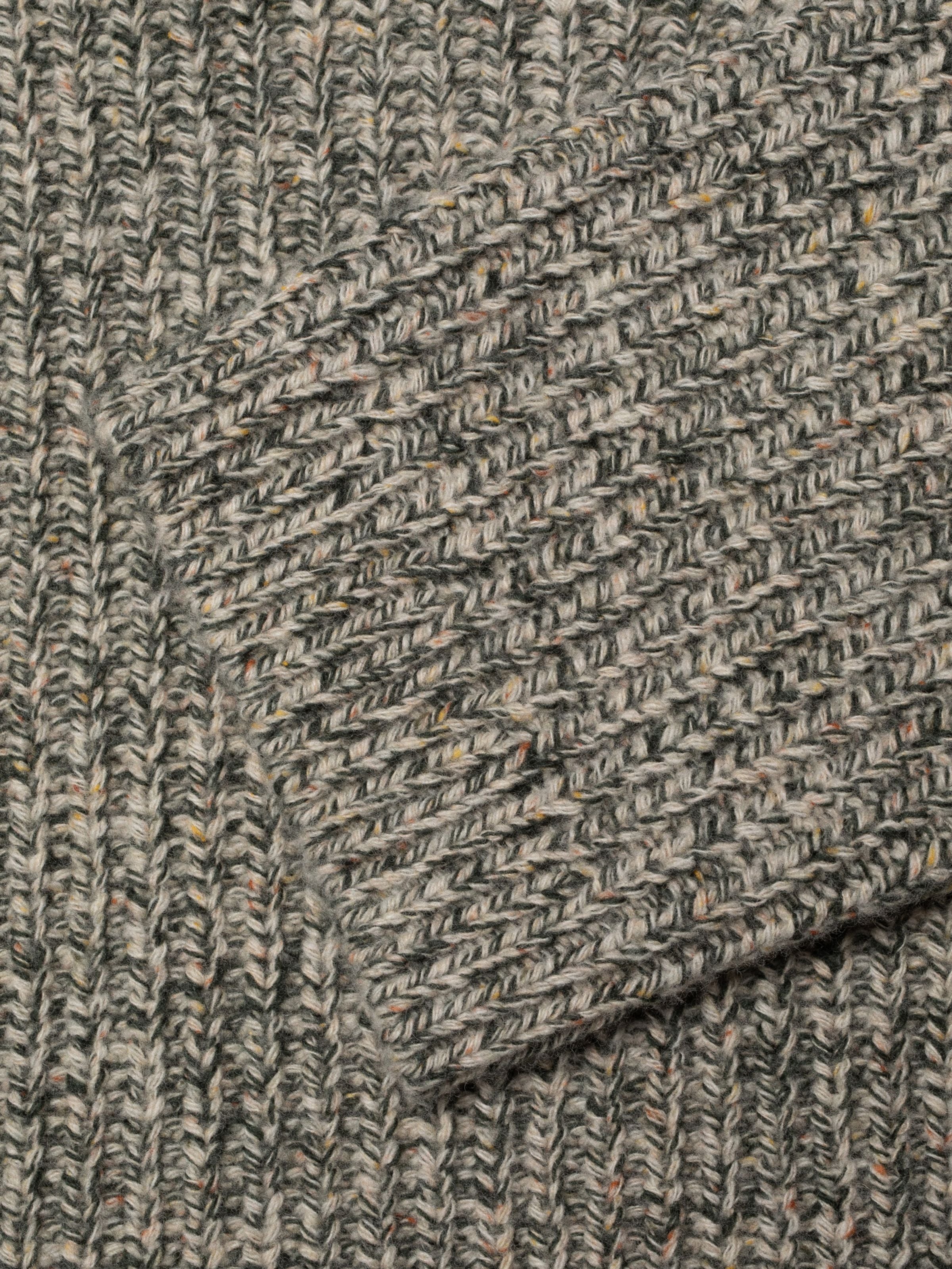 Nudie Jeans Gittan Sweater Chunky Knit in Green Melange, close-up view showing wool yarn texture.