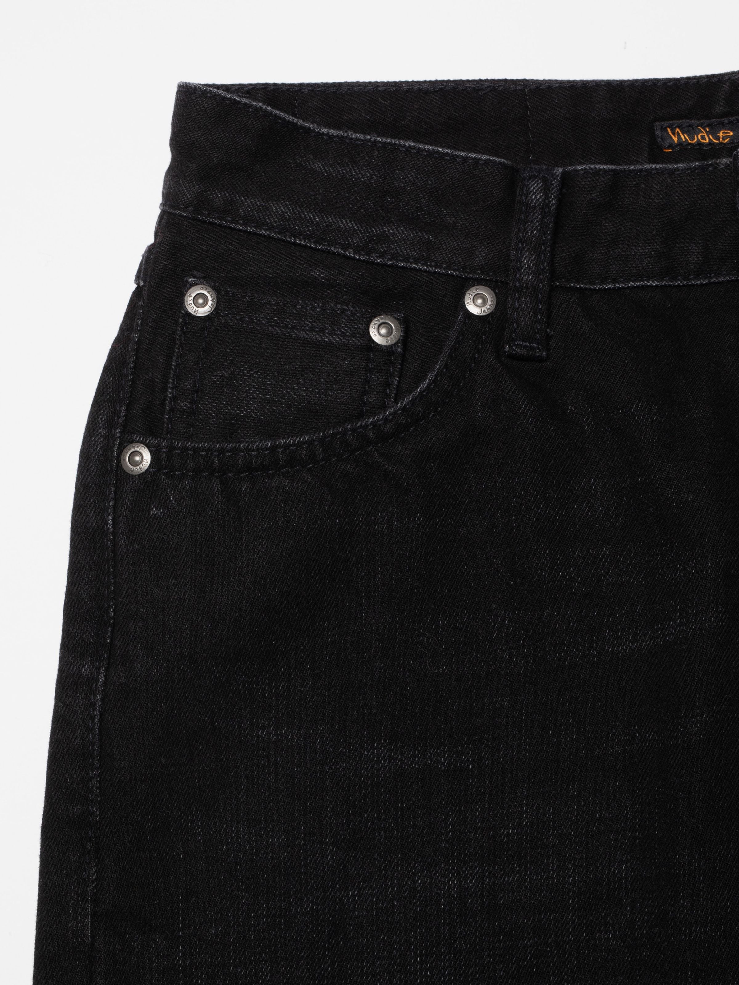 Nudie Jeans Sharp Charlie Midnight Ash, women's regular fit jeans, close-up of coin pocket and silver trims.
