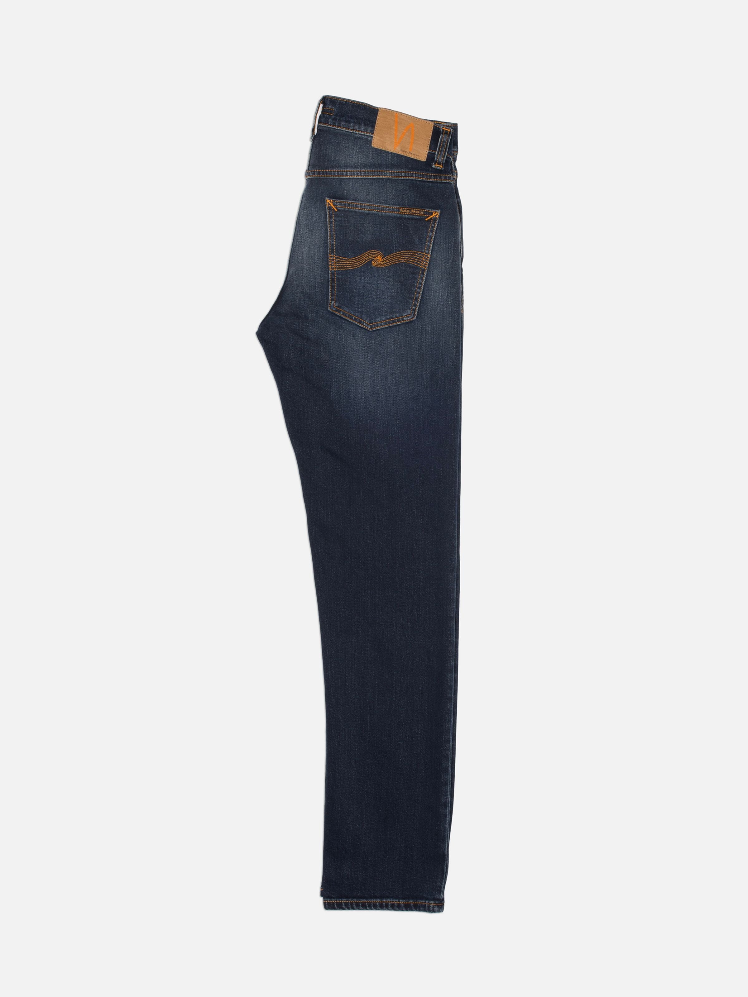 Nudie Jeans Solid Ollie Midnight Sky, schmale Herrenjeans, Rückansicht mit Gesäßtasche und Jacron-Patch.