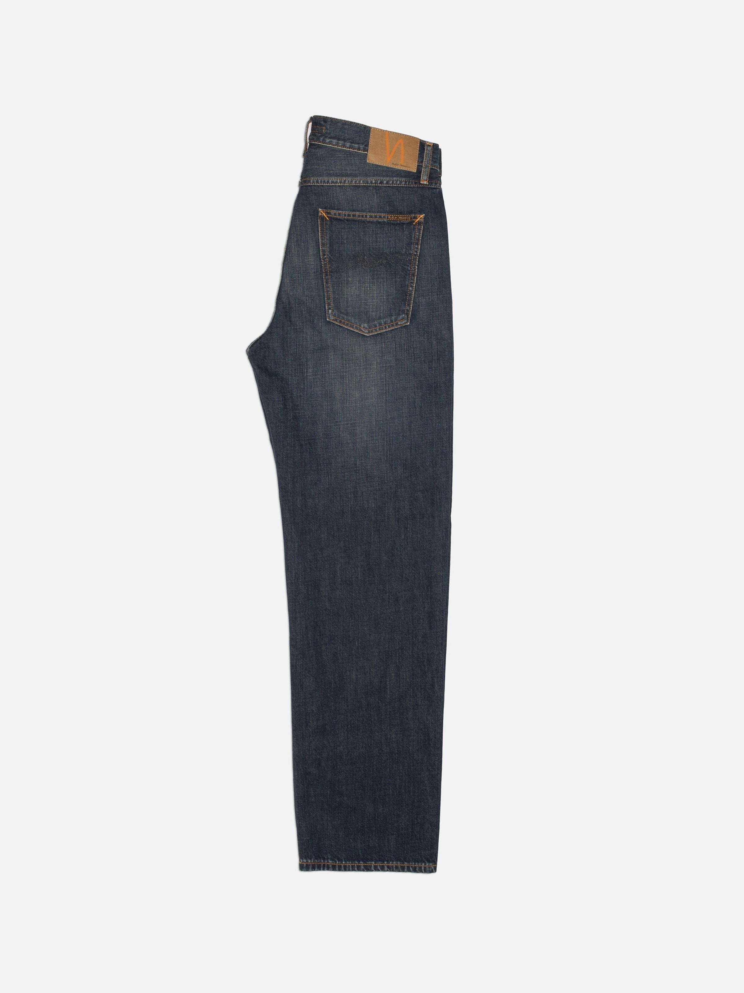 Nudie Jeans Tuff Tony Dirt Path, loose fit wide-leg jeans in dark blue organic denim, back view on white background.