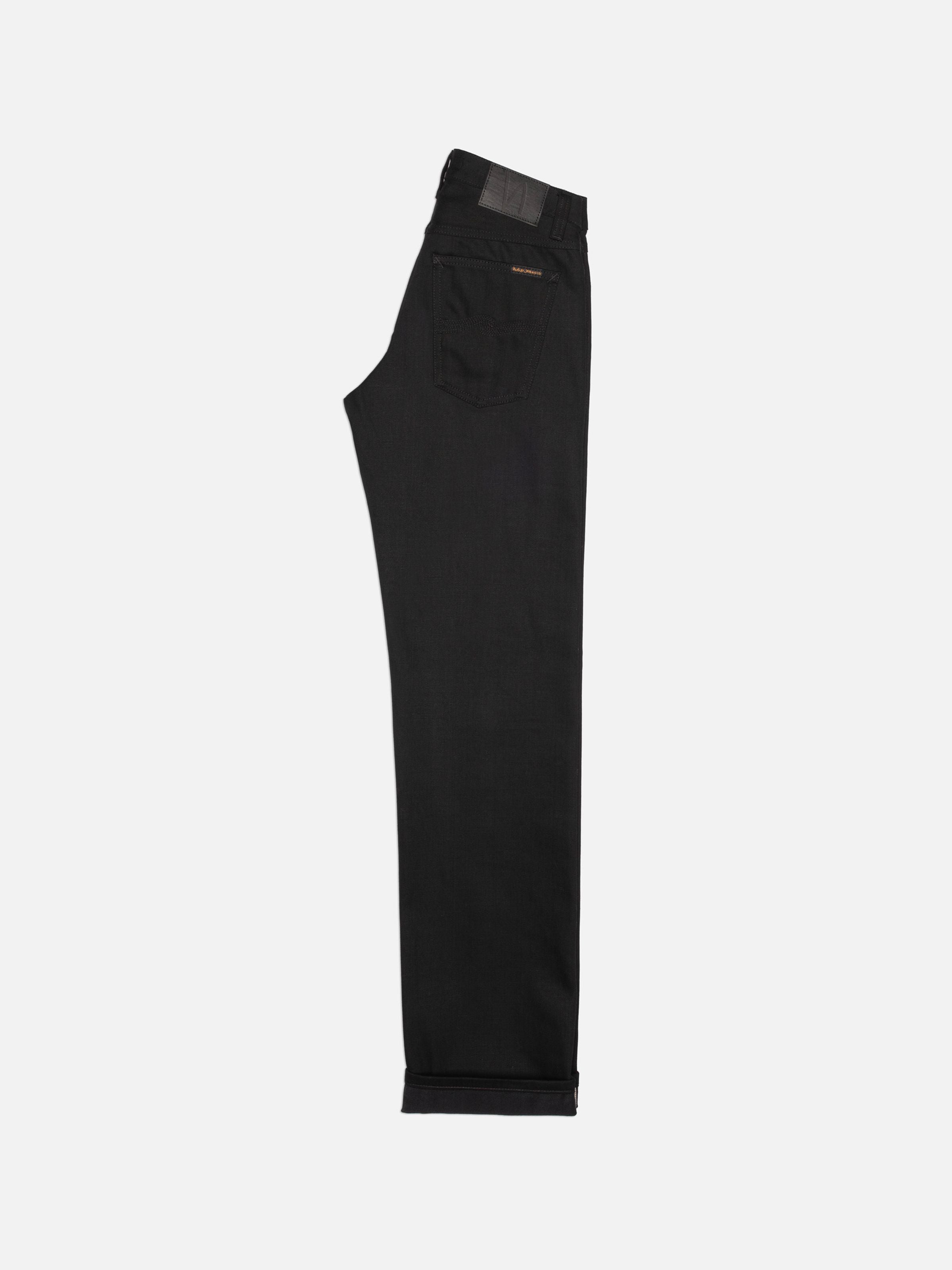 Nudie Jeans Sharp Charlie Space Black Selvage, straight fit jeans, back view.