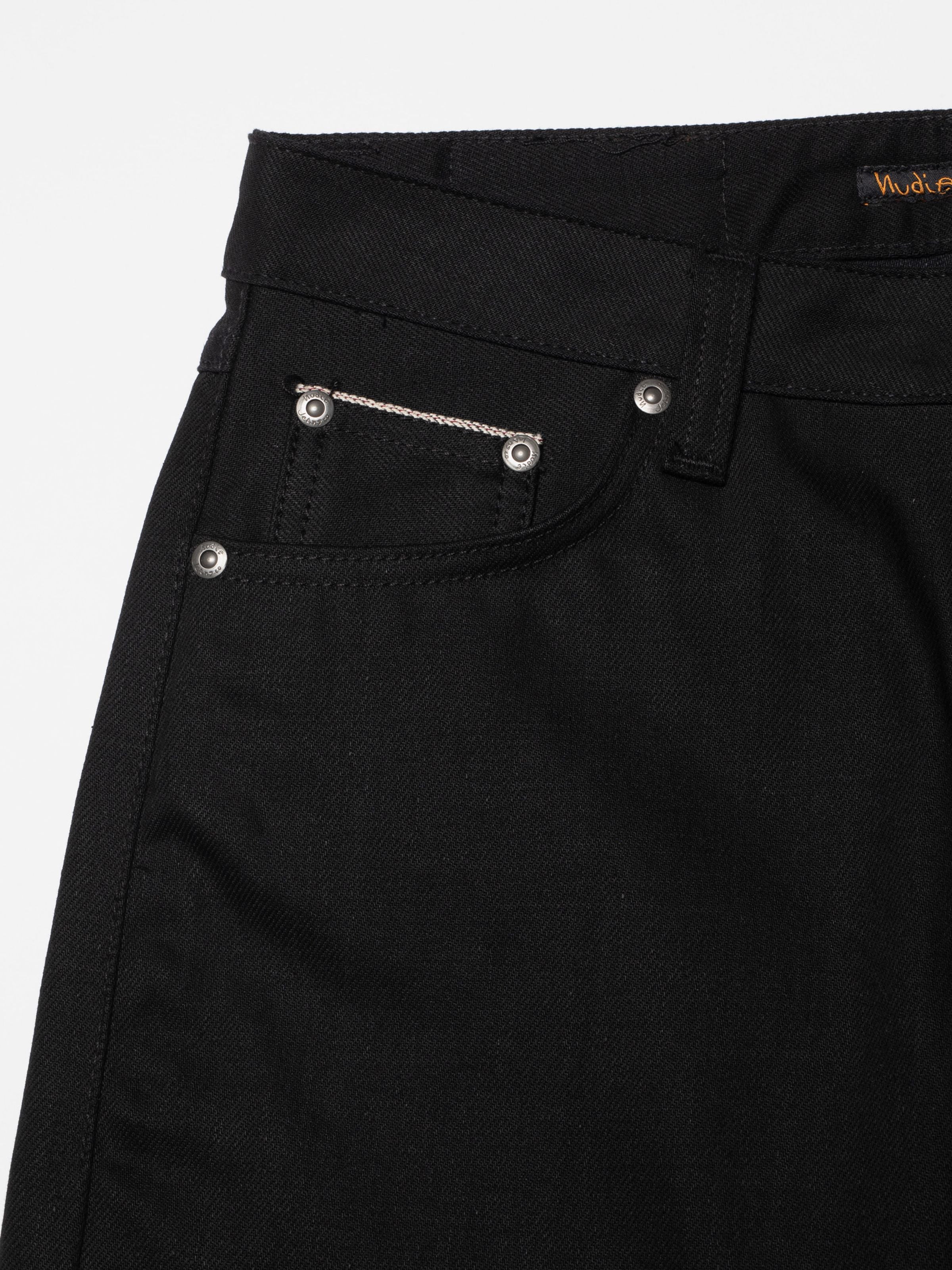 Nudie Jeans Sharp Charlie Space Black Selvedge, women's jeans, close-up of the front pocket and antique silver trims.