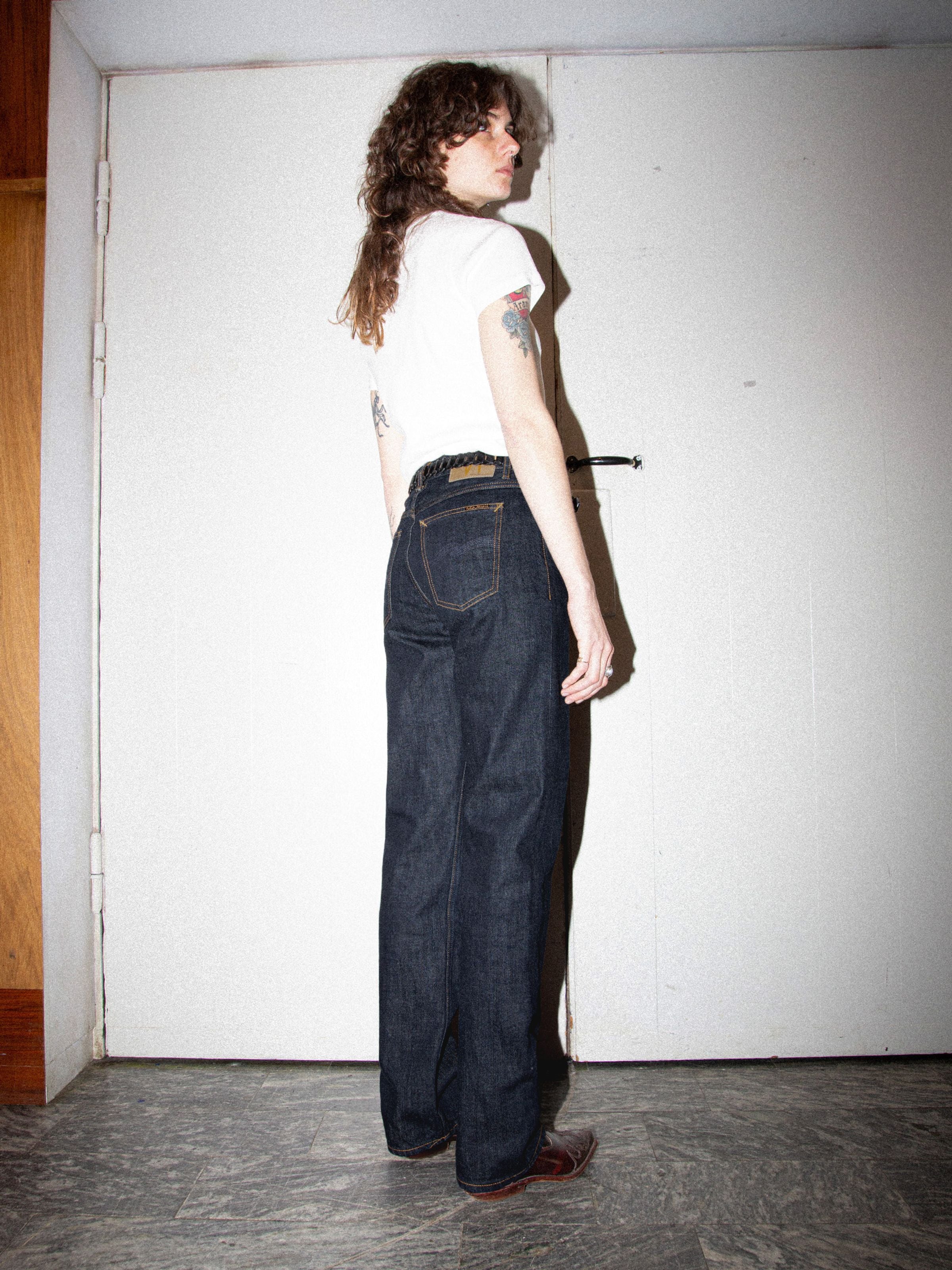 Nudie Jeans Sharp Charlie Blue One Wash, women's regular fit jeans in dark blue organic cotton, shown worn from the back.